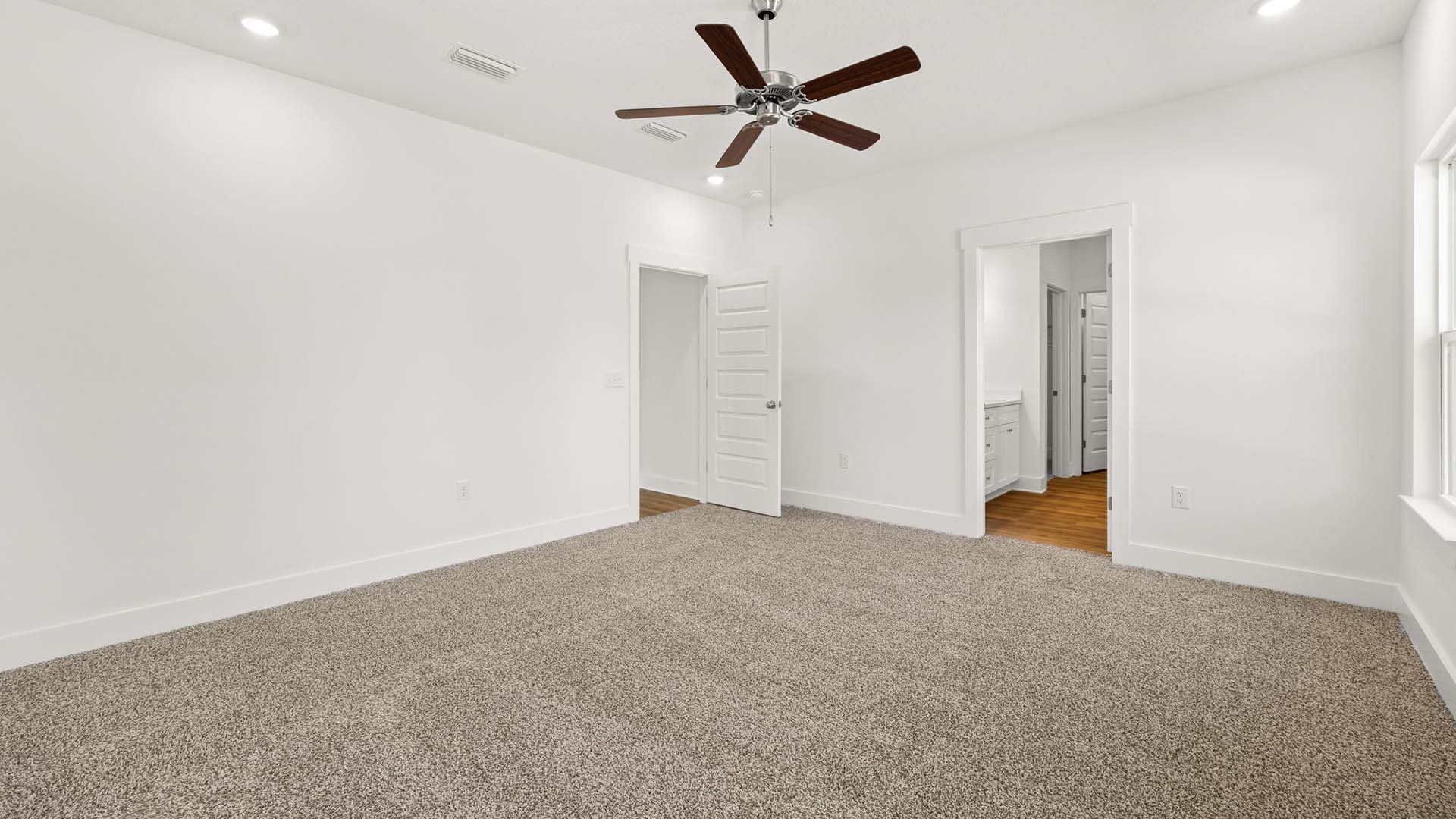 The primary bedroom has carpet