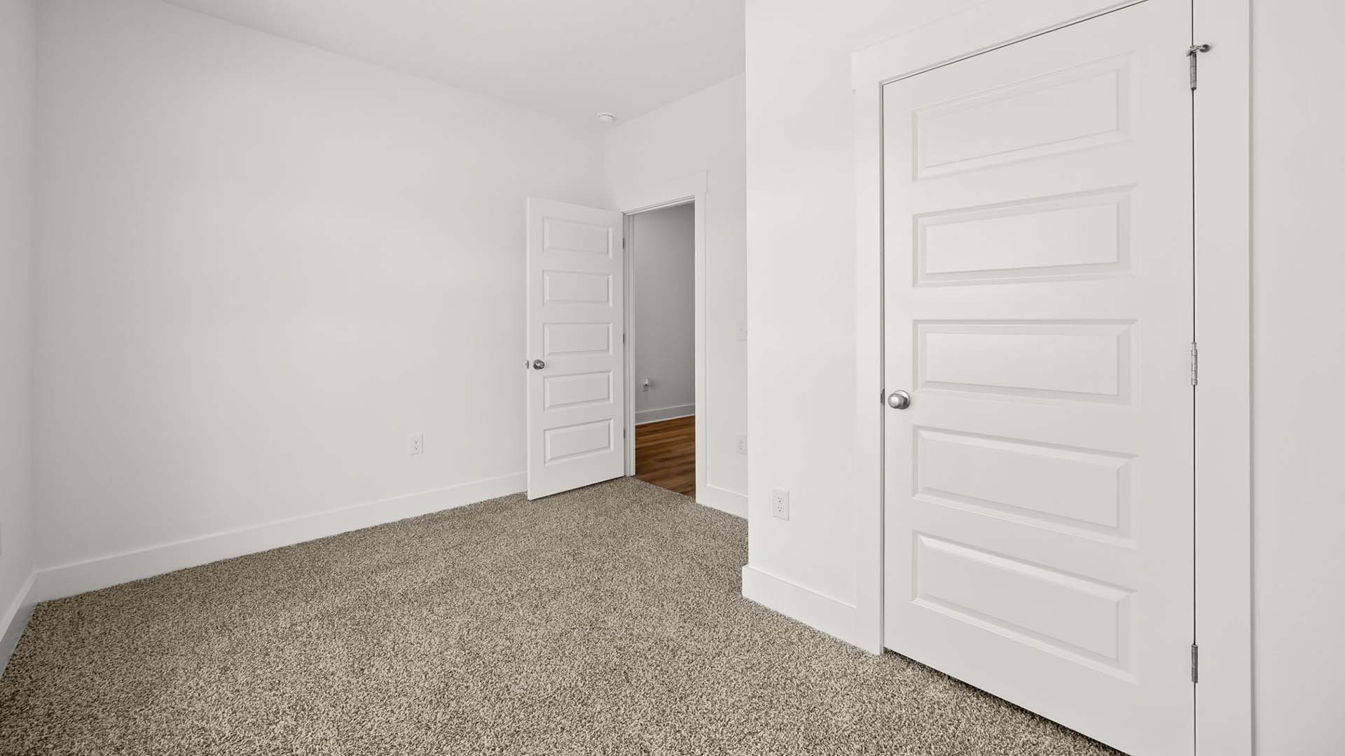 Guest bedrooms have ample closet space