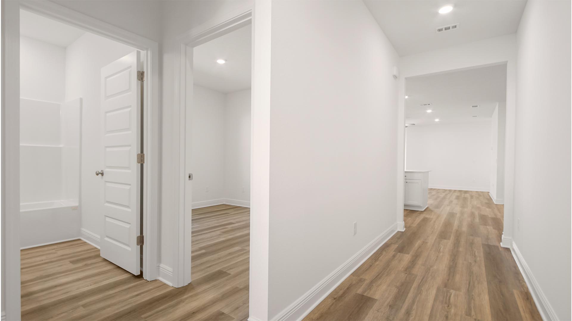 Entry hall to the open living area with EVP flooring