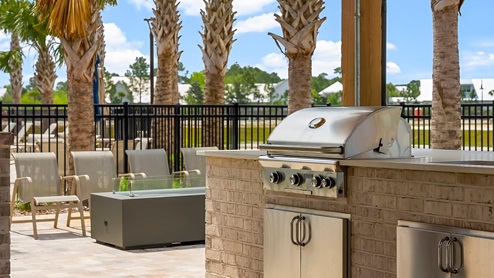 Outdoor kitchen located at the community pool and amenity area