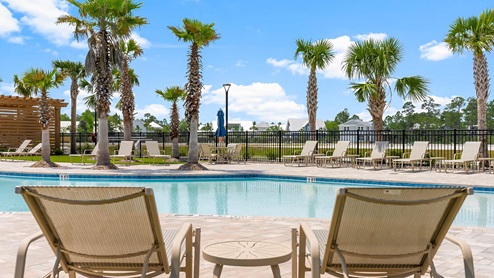 Enjoy the Florida sun poolside after a day at the beach.