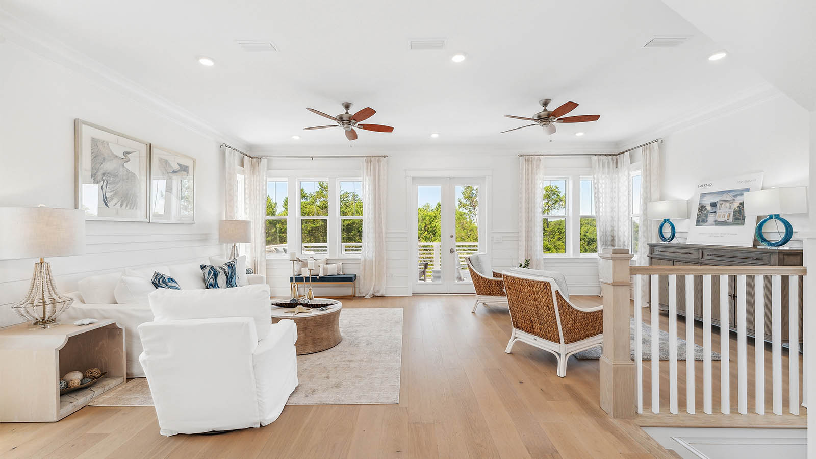 The living space on the second level includes a living room area