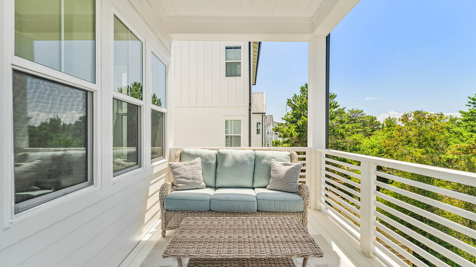 The second level balcony has space for a swing and outdoor dining area or chairs