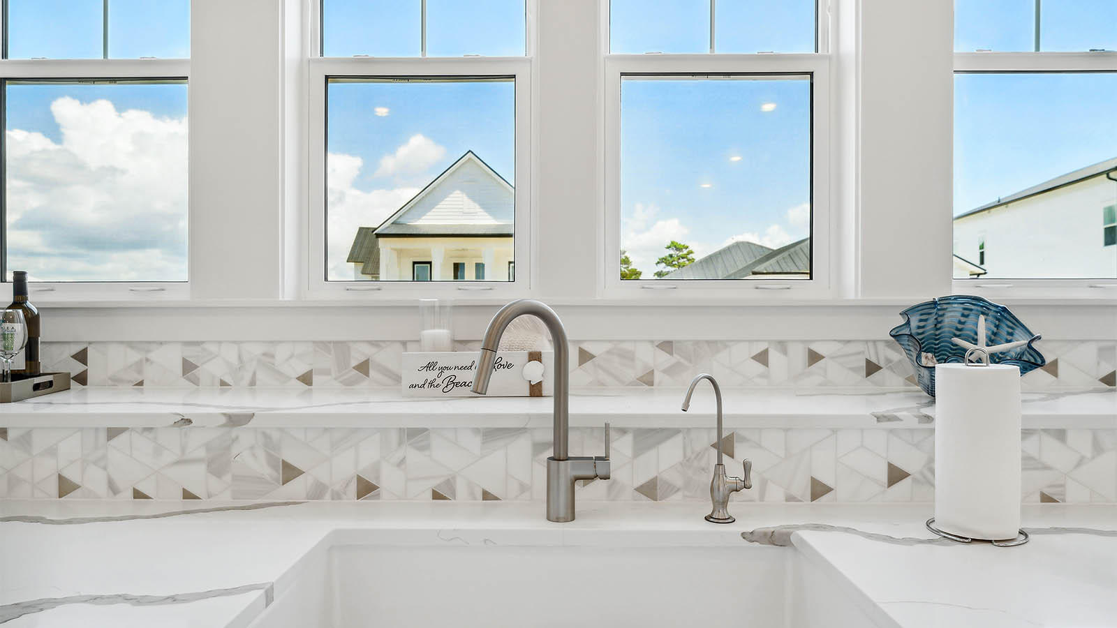 The kitchen has a farm style sink