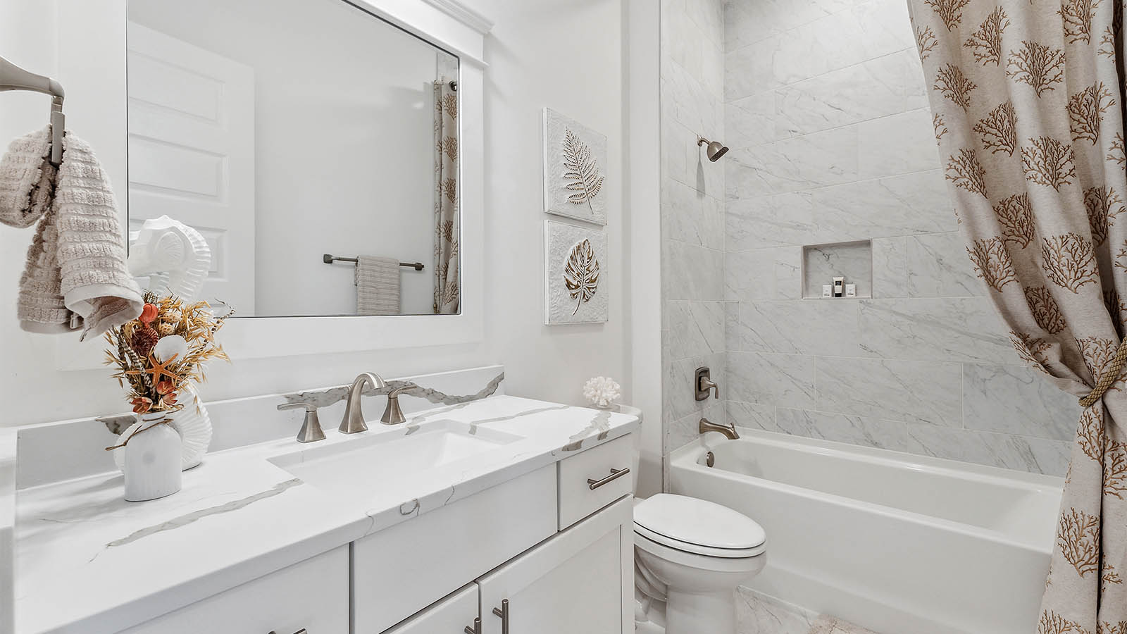 There is a shared bathroom for the two additional guest bedrooms on the third level