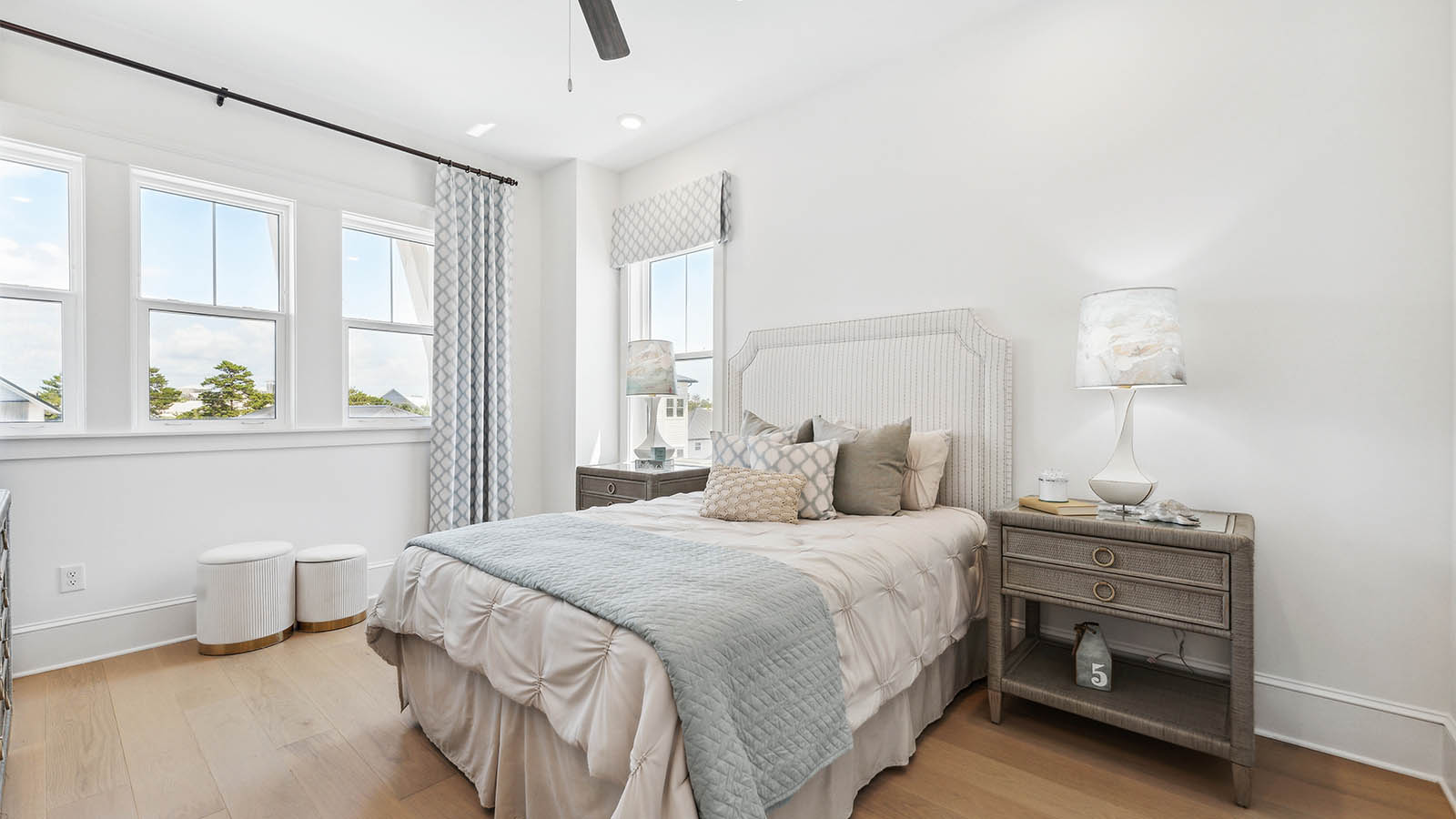 The guest bedrooms overlook the front of the home