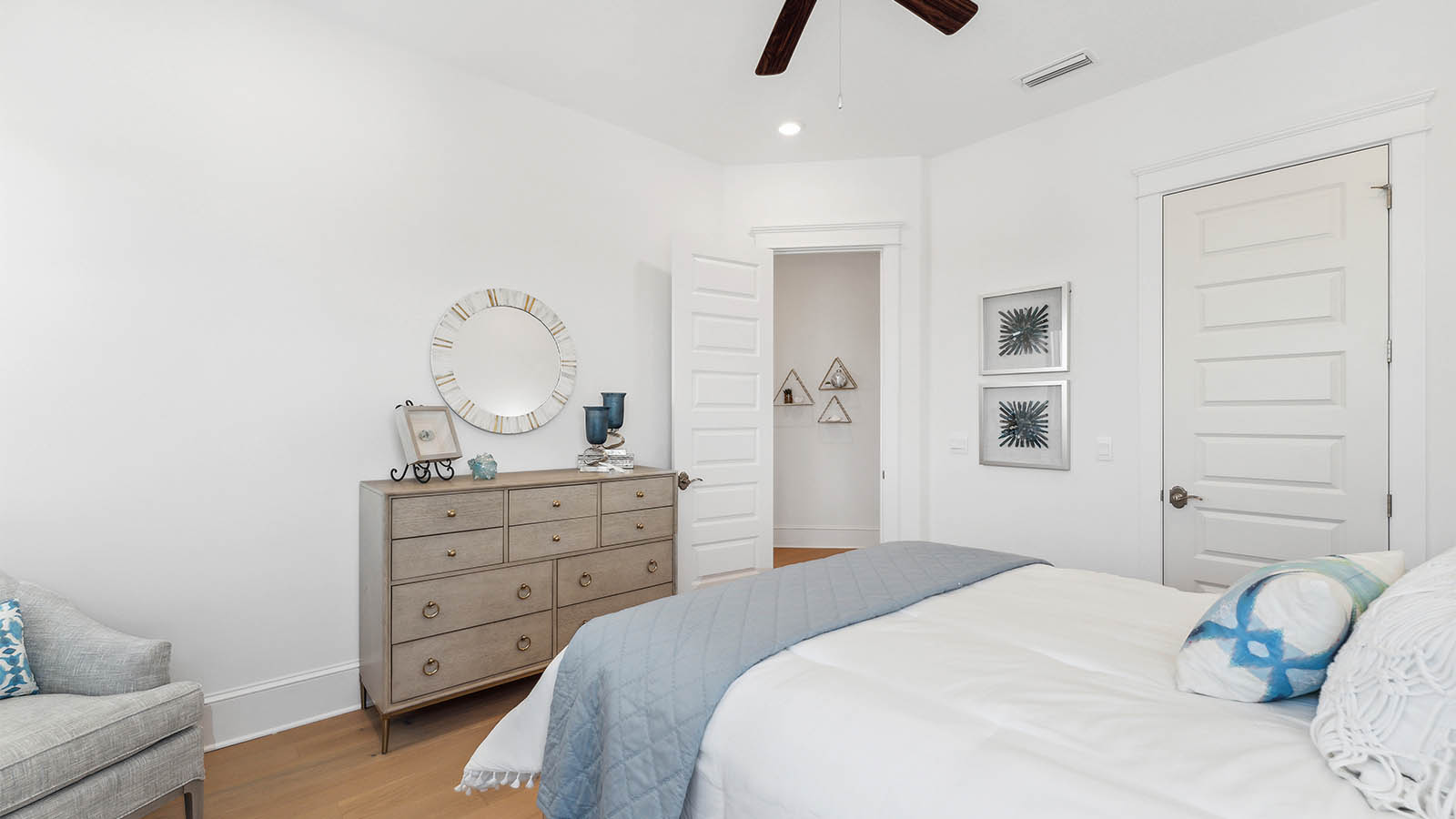 Guest bedrooms on the third floor are located at the opposite end from the primary bedroom