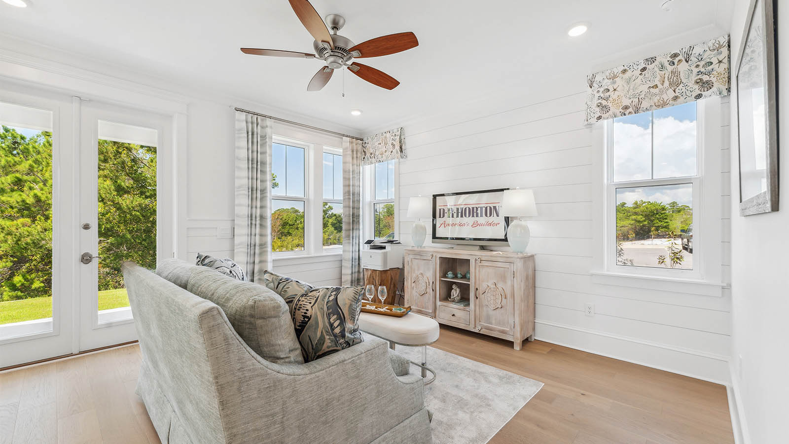 This room has access to a covered patio on the main level