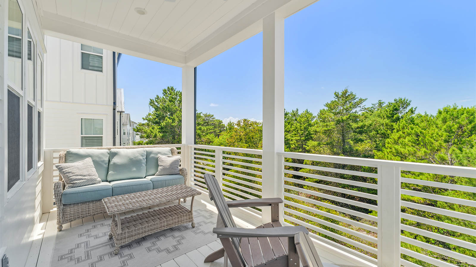 There is covered balcony on the second level