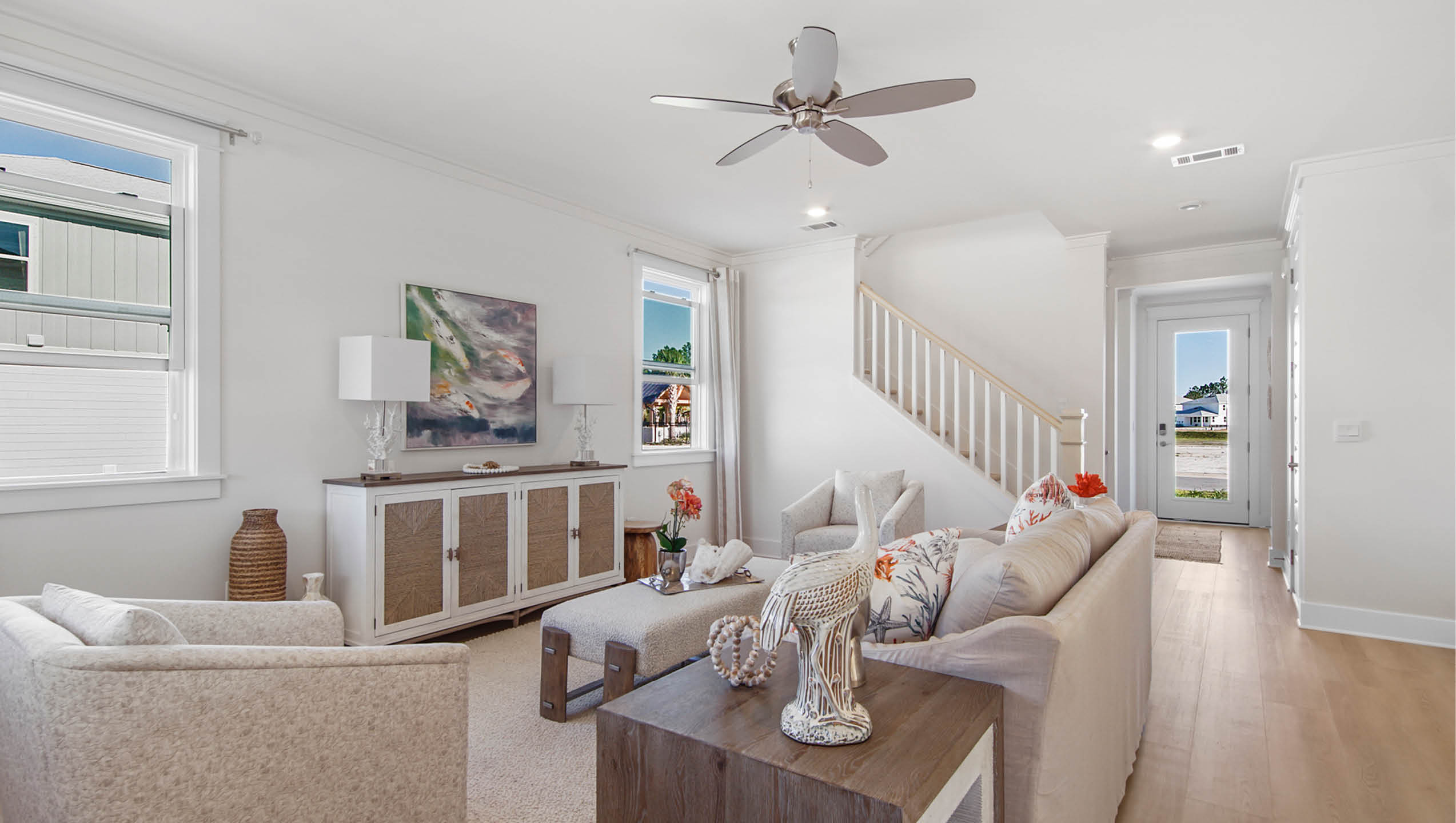 Open great room with overhead ceiling fan