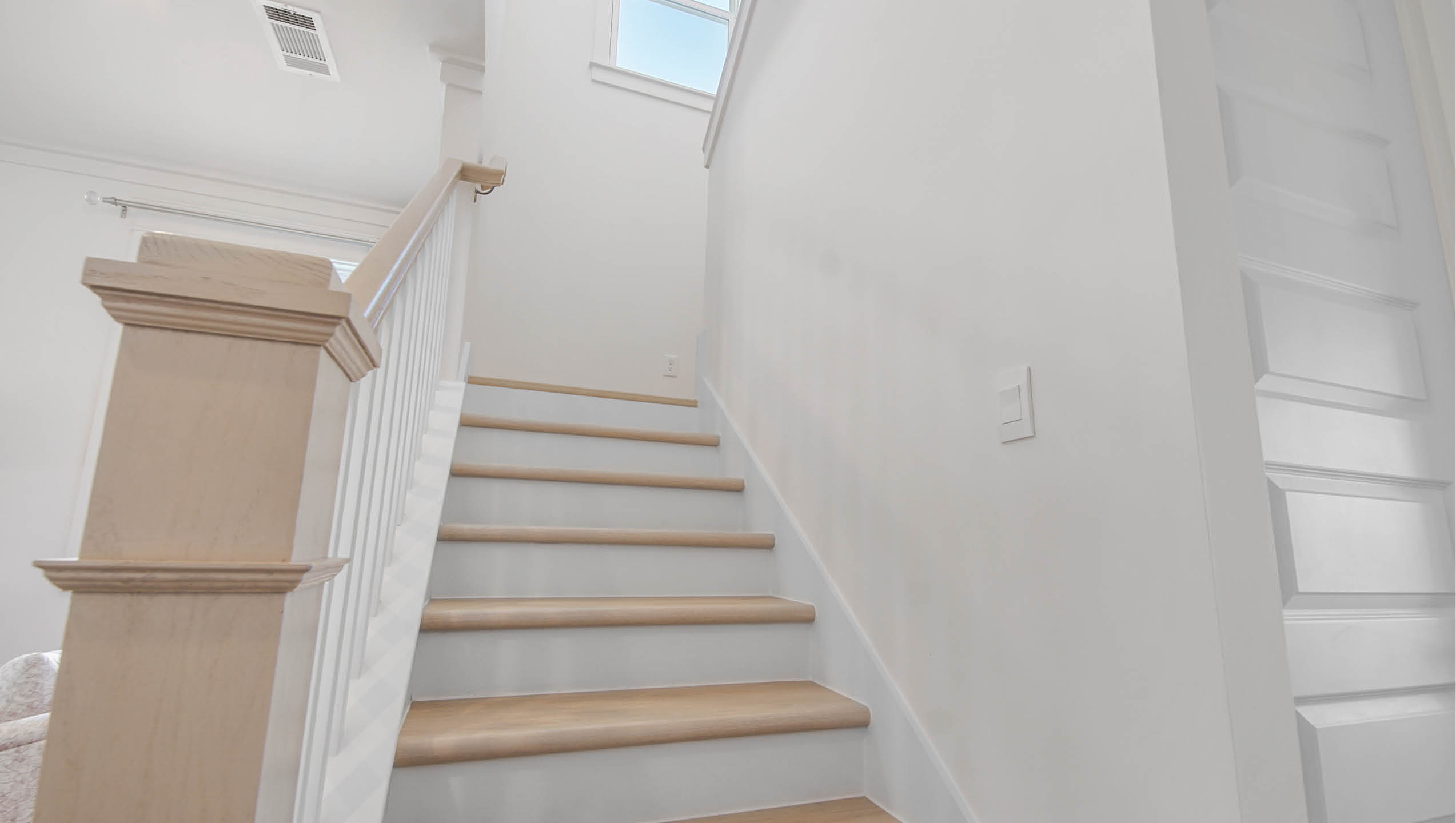 Wood stairs leading to level two