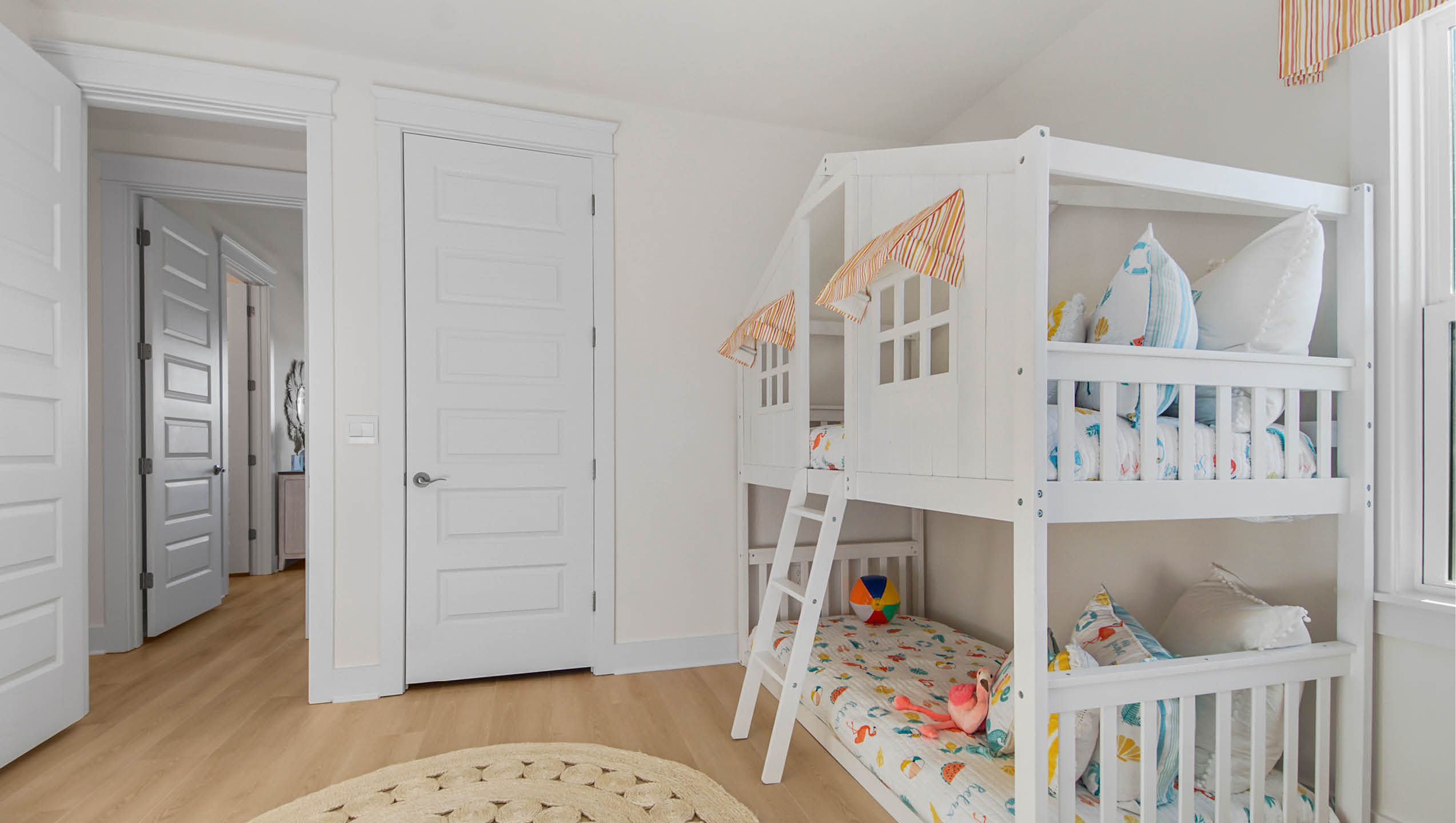 Bedroom three with wood floor