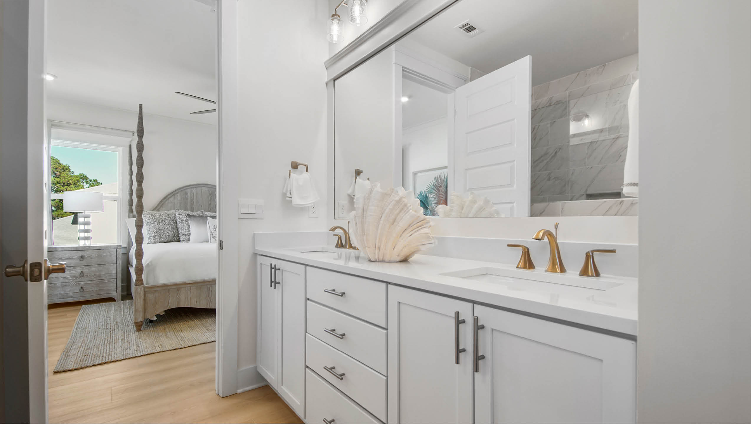 Primary bathroom showing access to bedroom