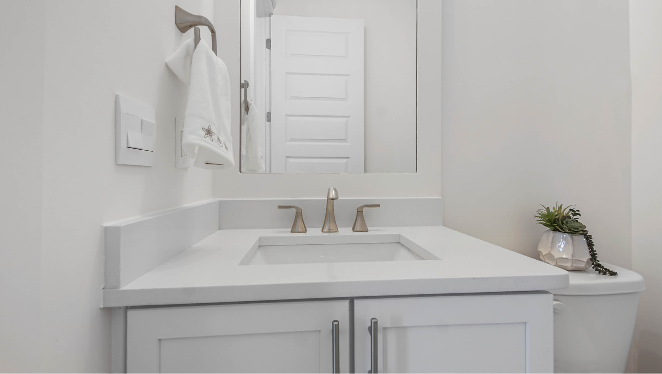 Main level powder room with vanity