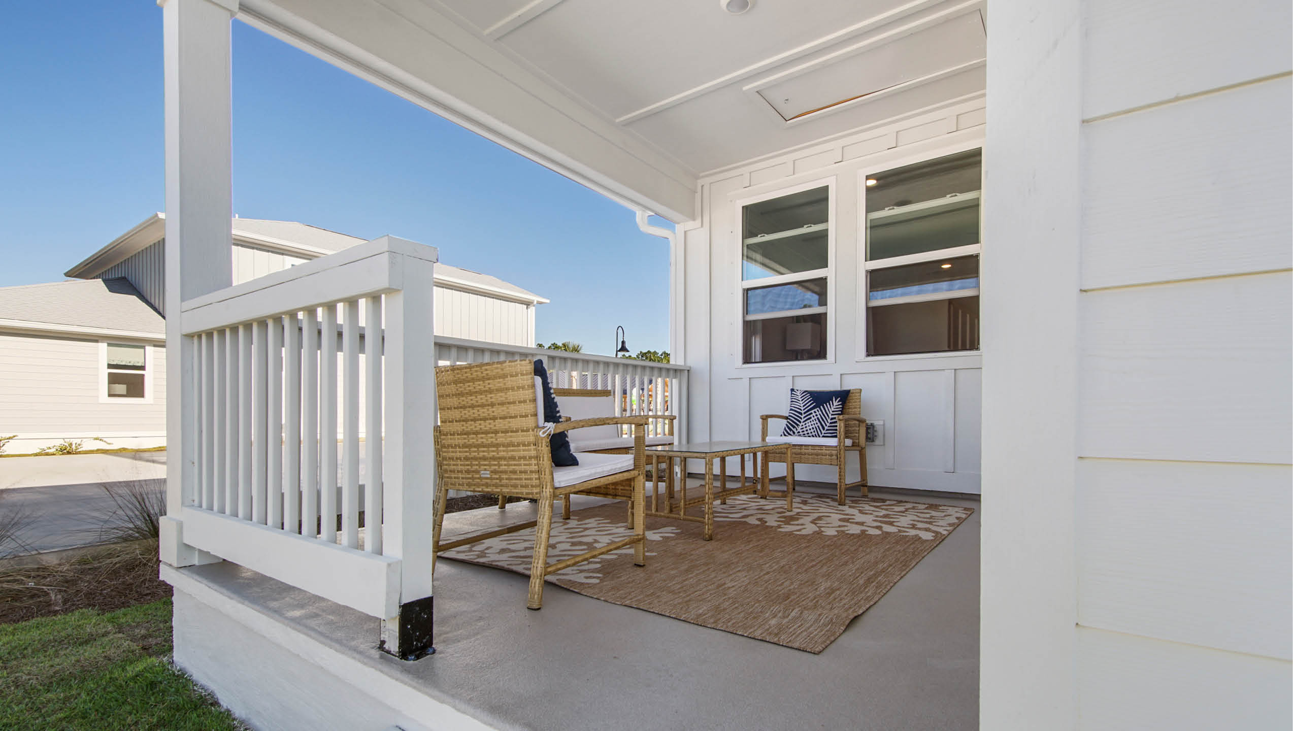 Covered patio with space for sitting area or dining table and chairs