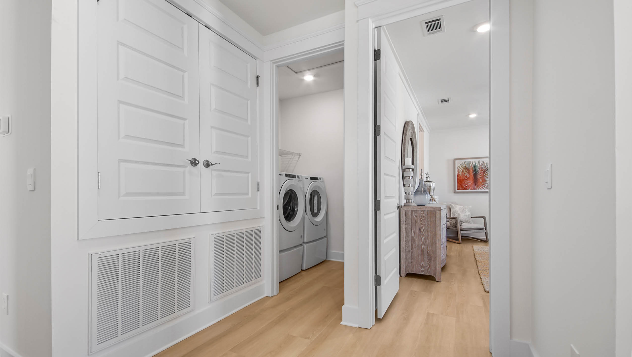 Second level landing area looking at laundry room