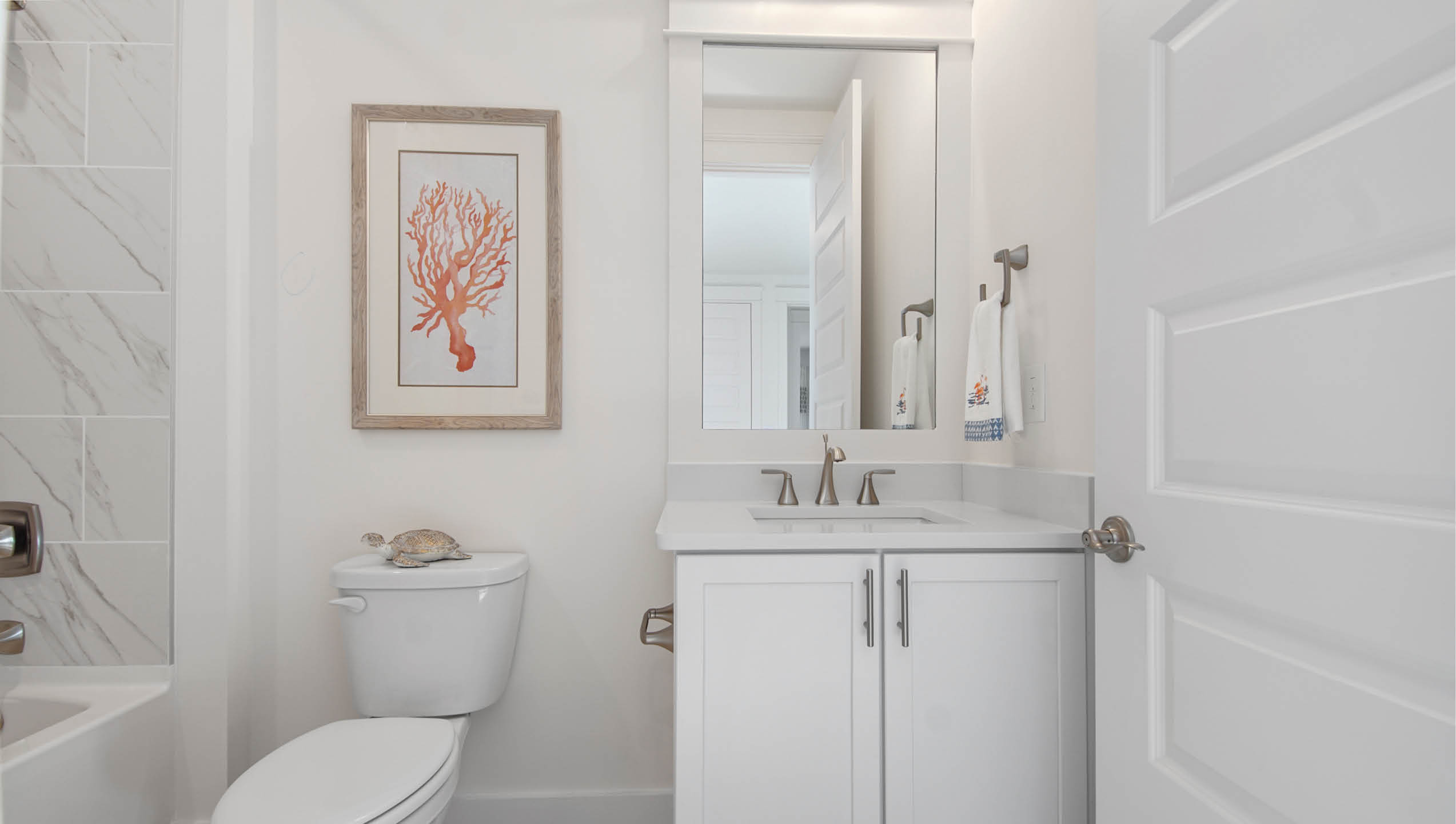 Bedroom four bath with quartz countertop on vanity and lower cabinetry