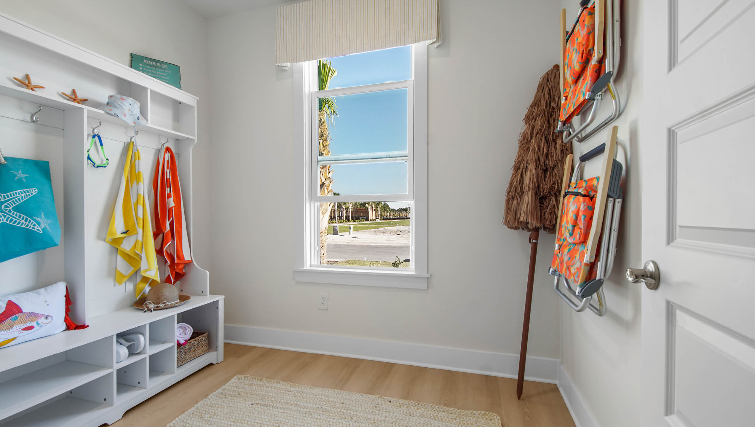 Office space that staged as a space for your beach gear, shoe storage and pool towels