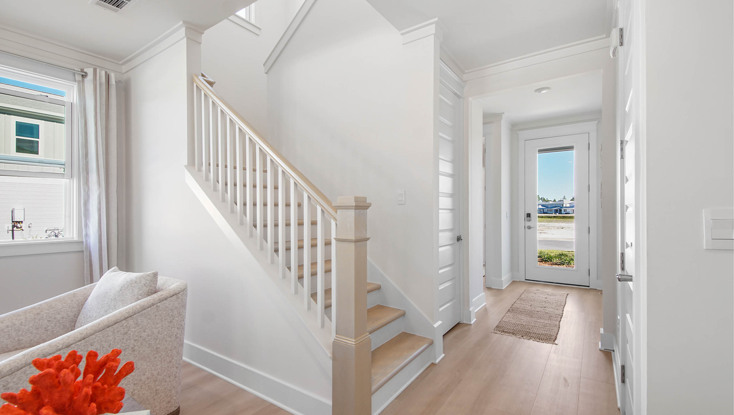 View of entry hallway with wood flooring
