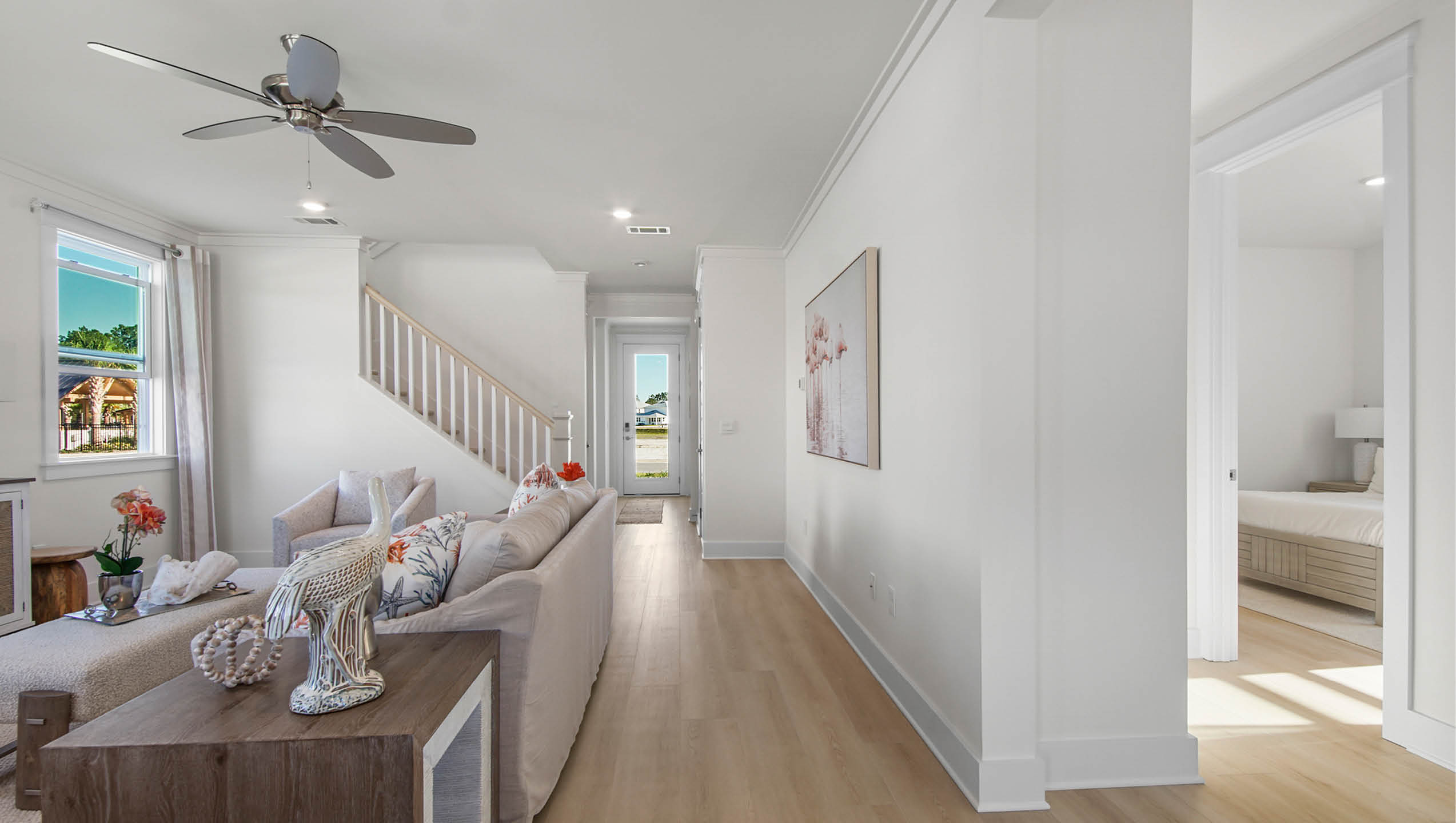 Great room to entry and view of bedroom 2 on main level