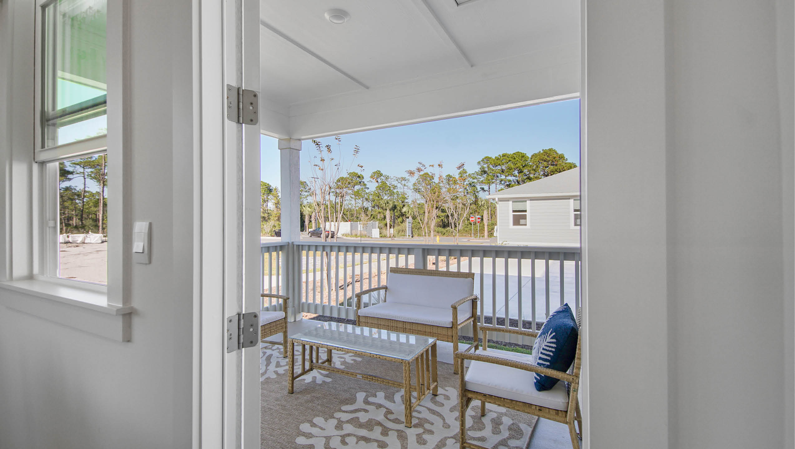 Door leading to rear covered patio