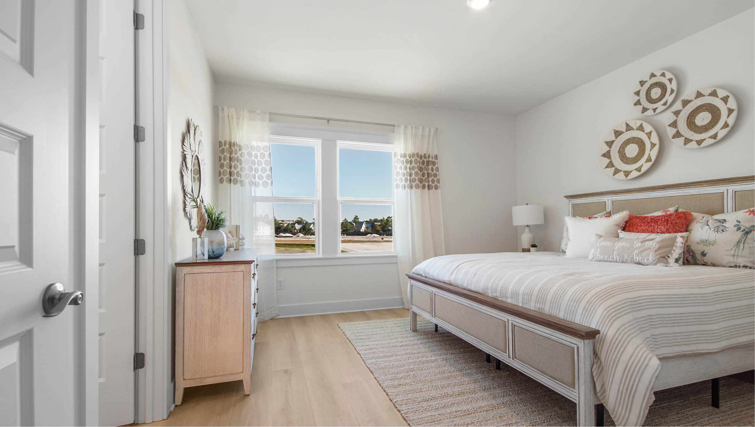 Bedroom five with wood floor