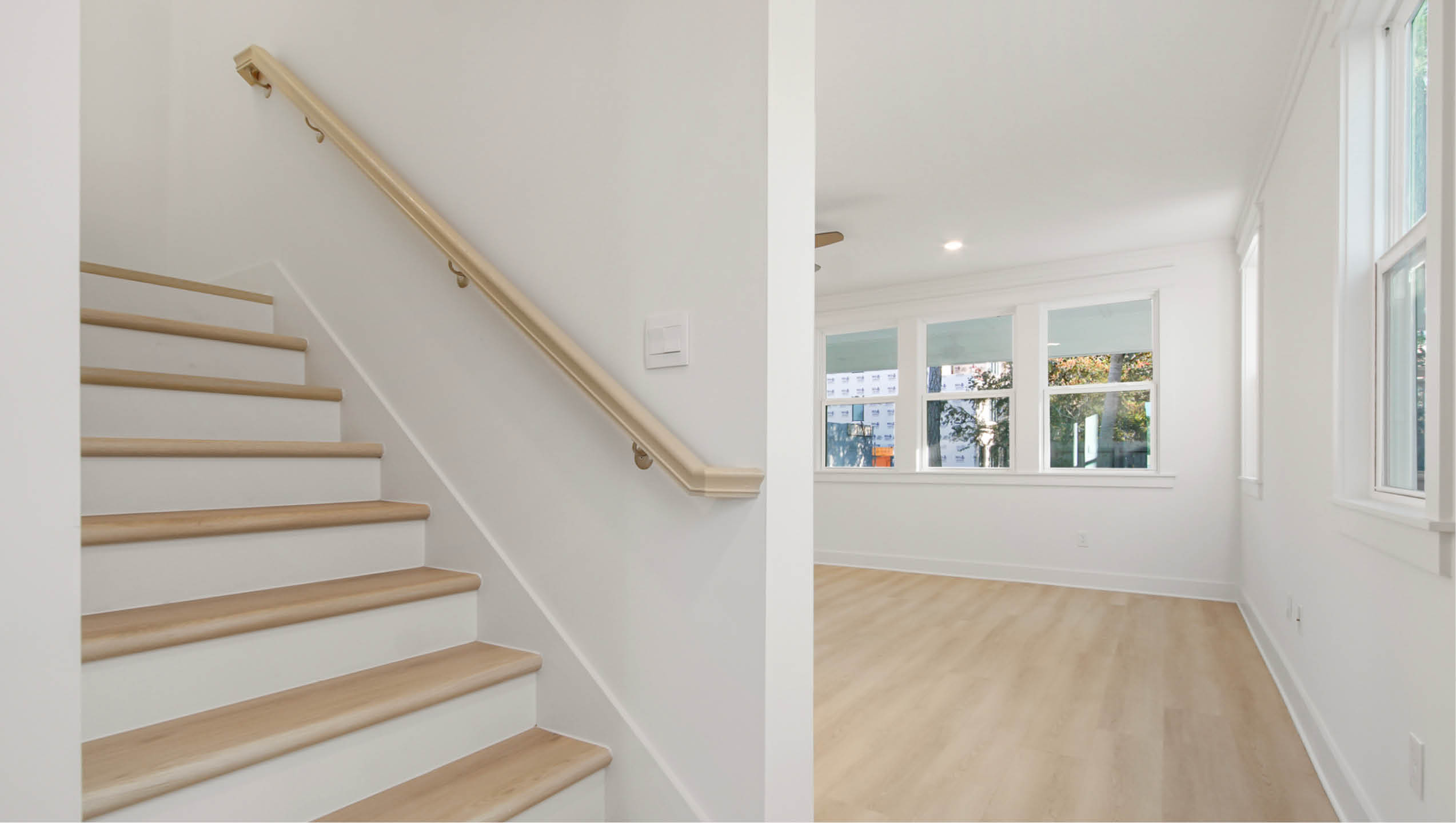 Stairs leading to great room and upstairs bedrooms