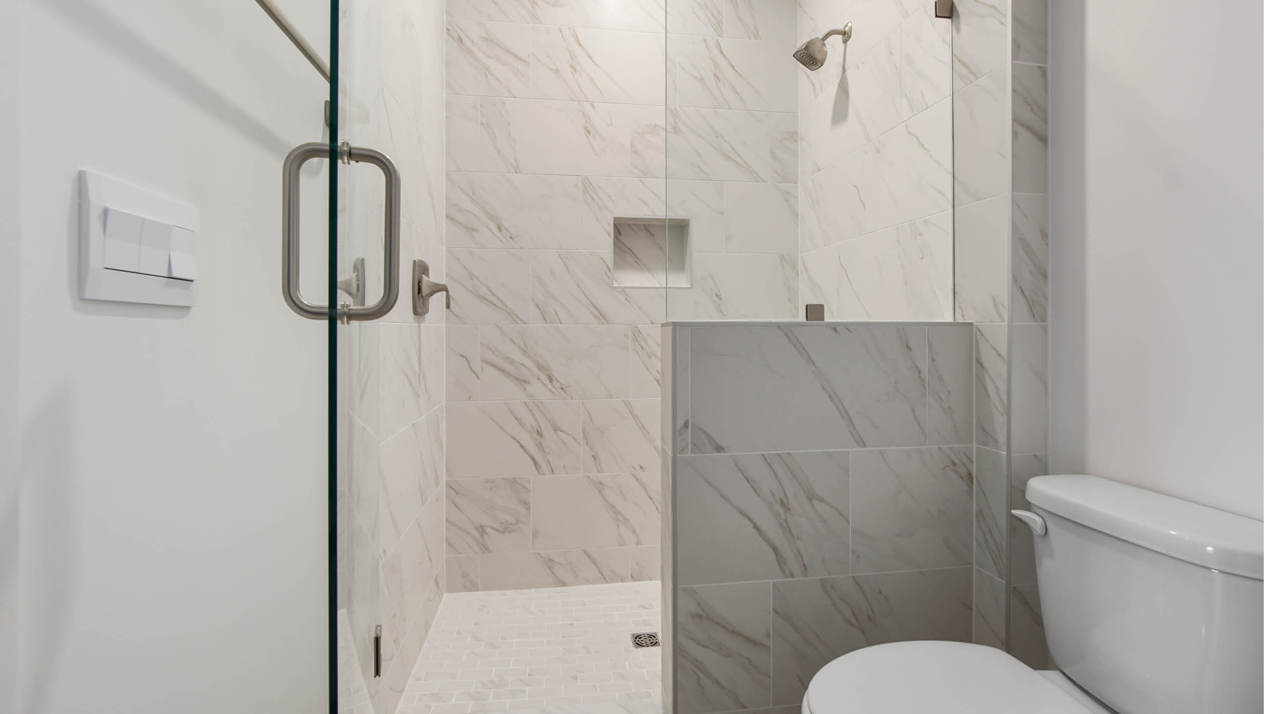 Bedroom four private bath with glass enclosed tile shower