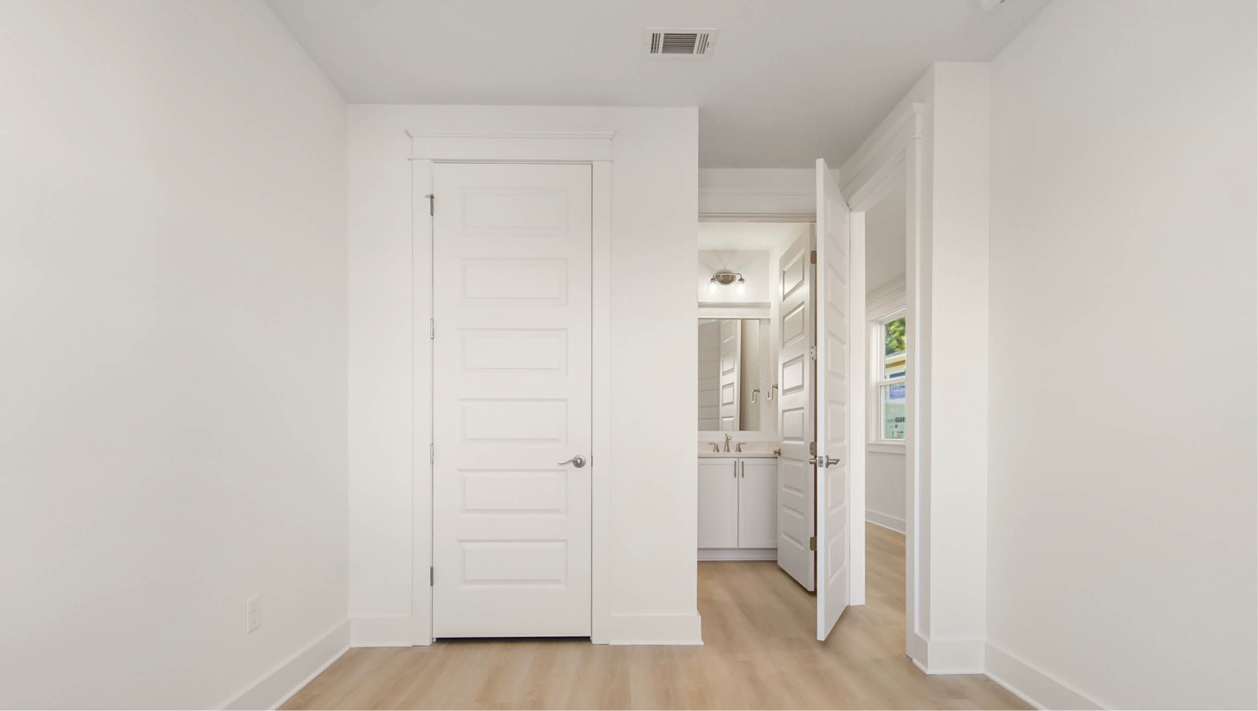 Main level bedroom two with spacious closet
