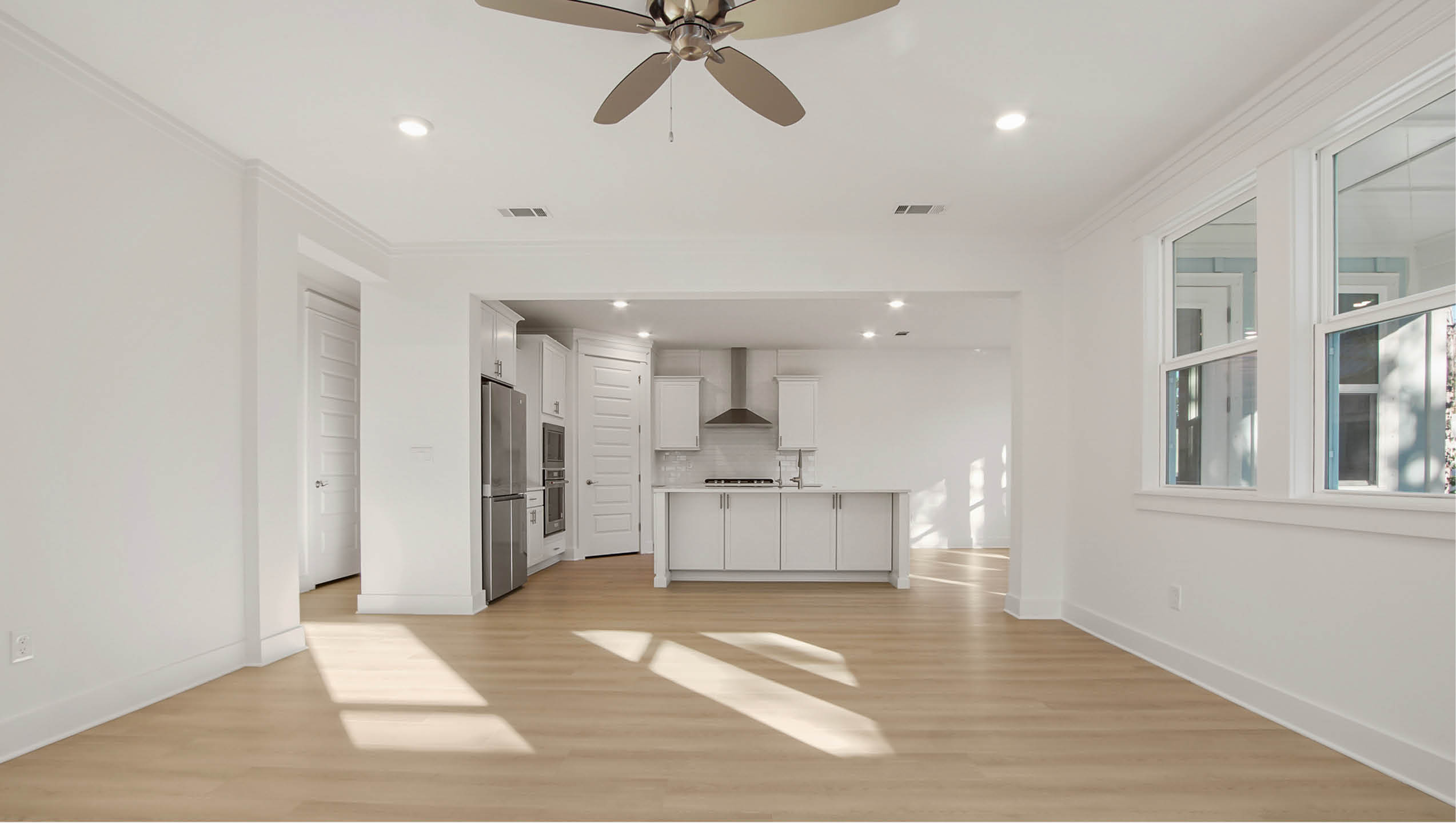 Spacious great room with windows for plenty of natural light