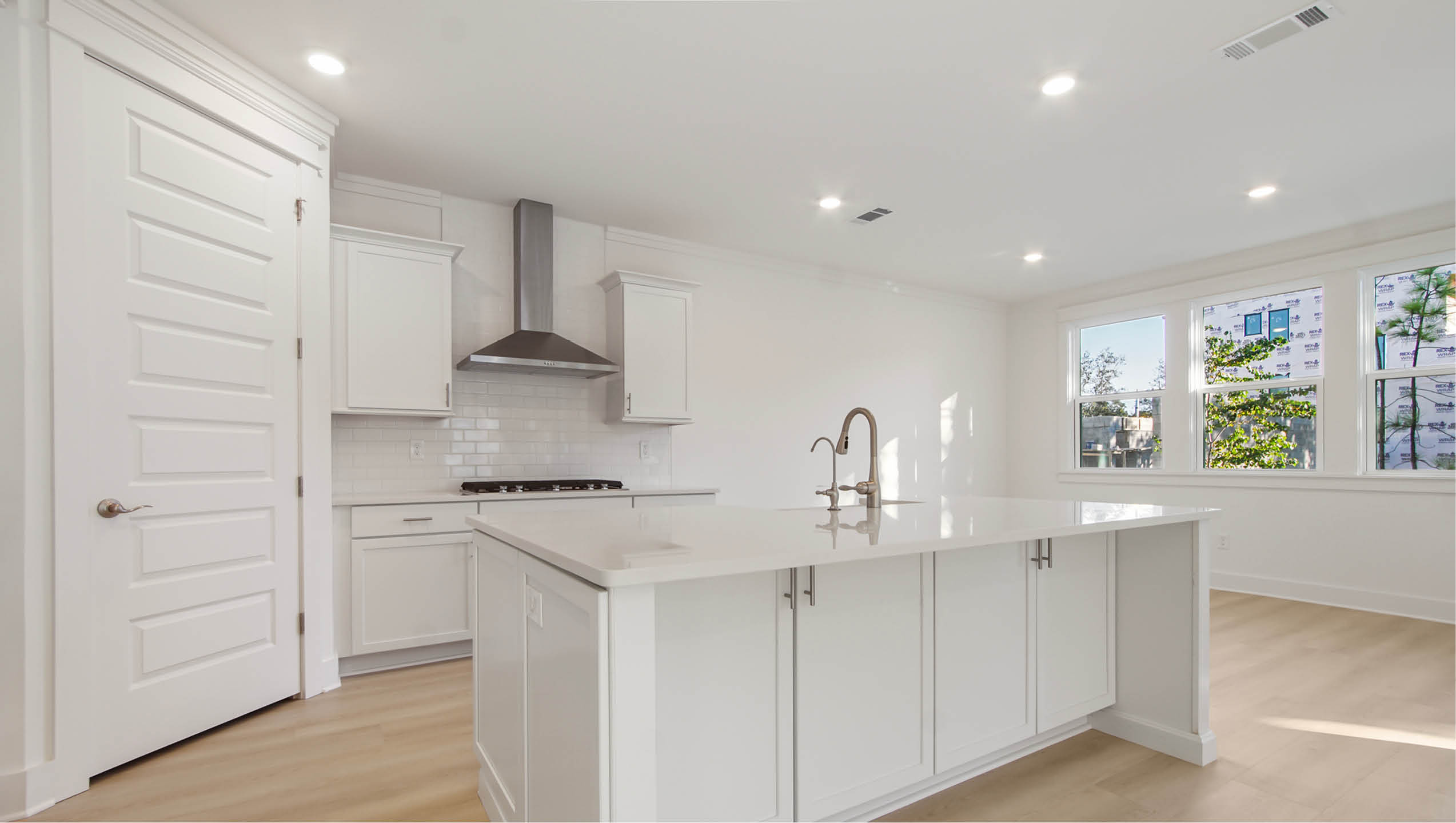 Kitchen with spacious center island and dining area