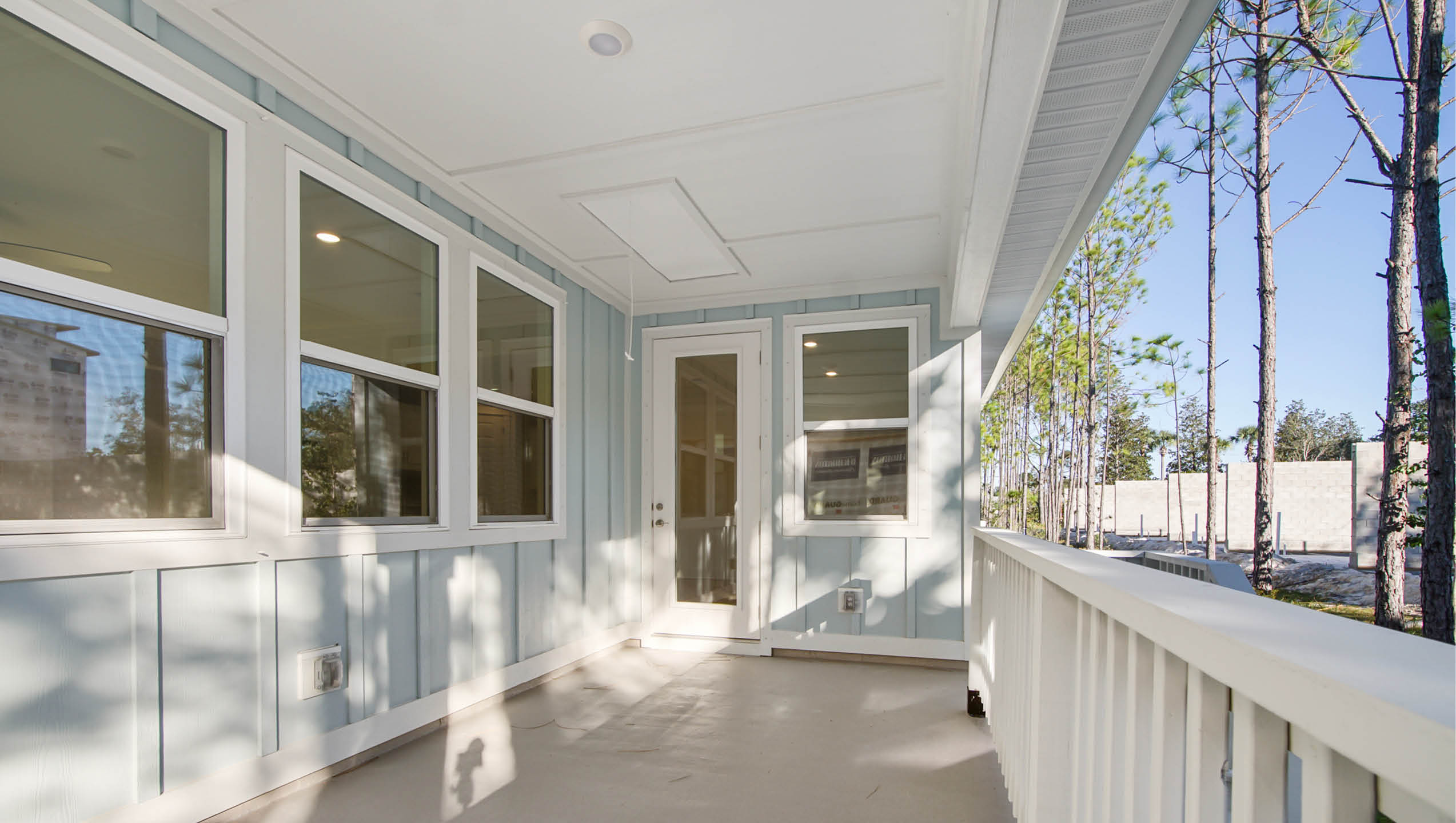 Covered porch with space for dining table and chairs or sitting area