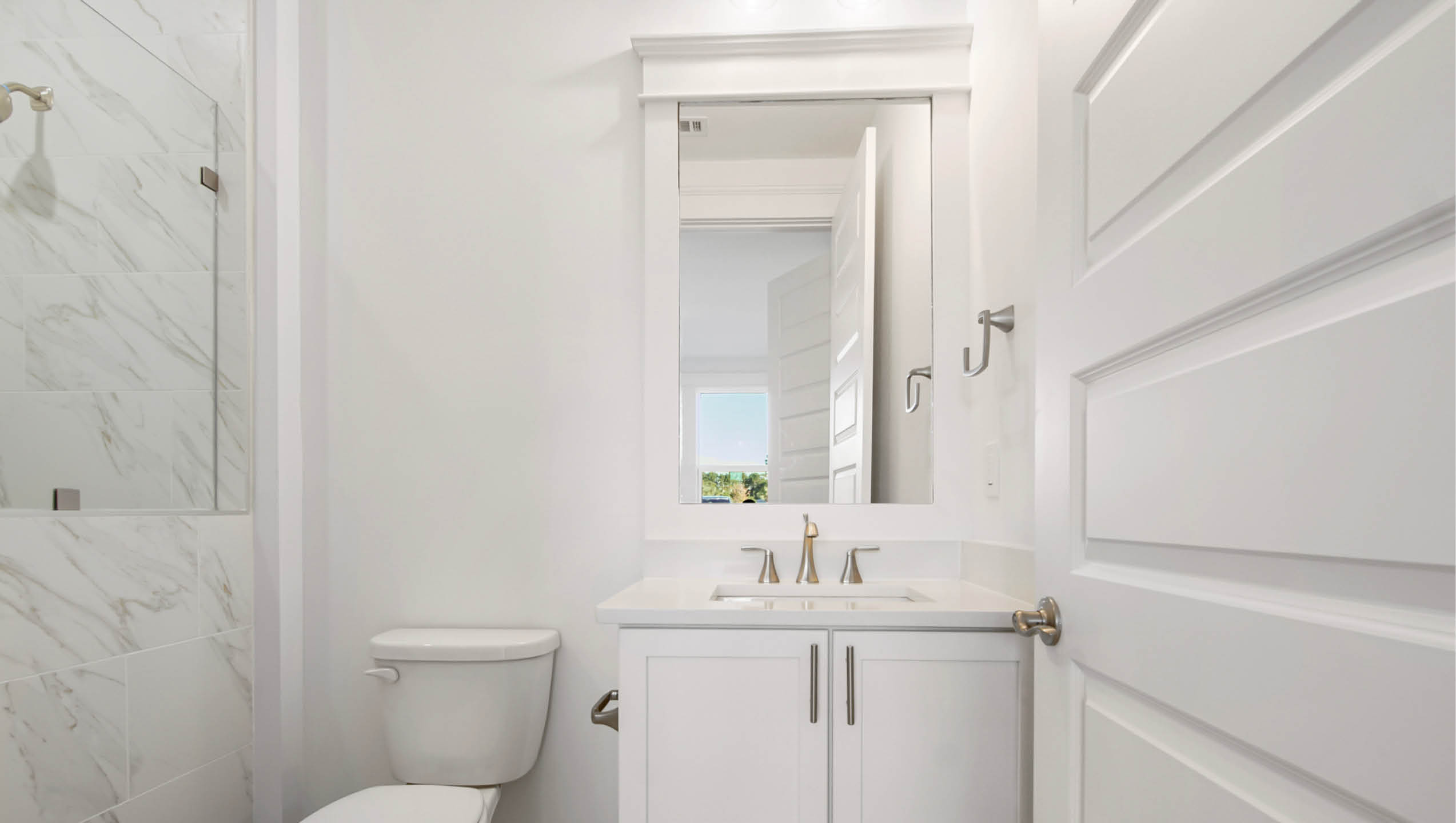 Private bath in bedroom two on main level