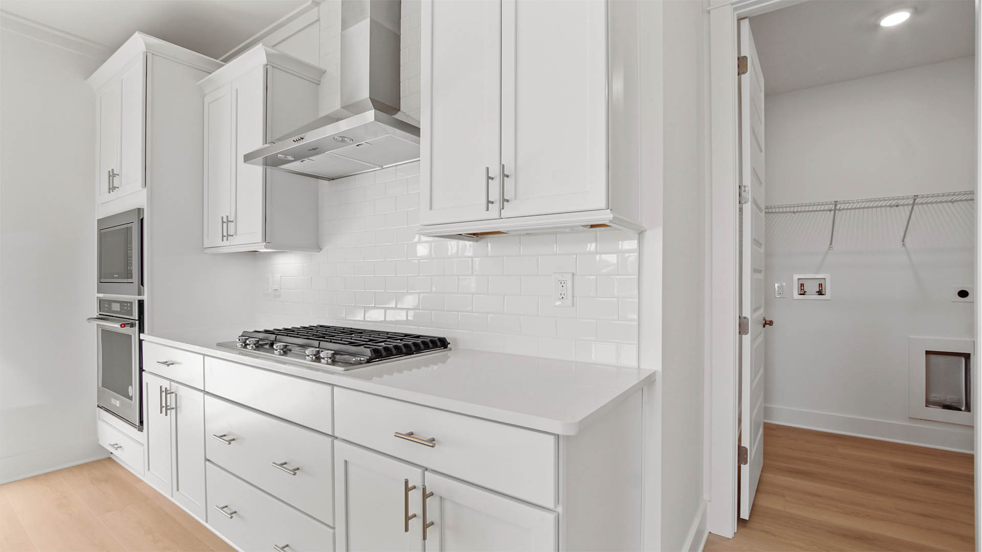 Laundry room is located off the kitchen