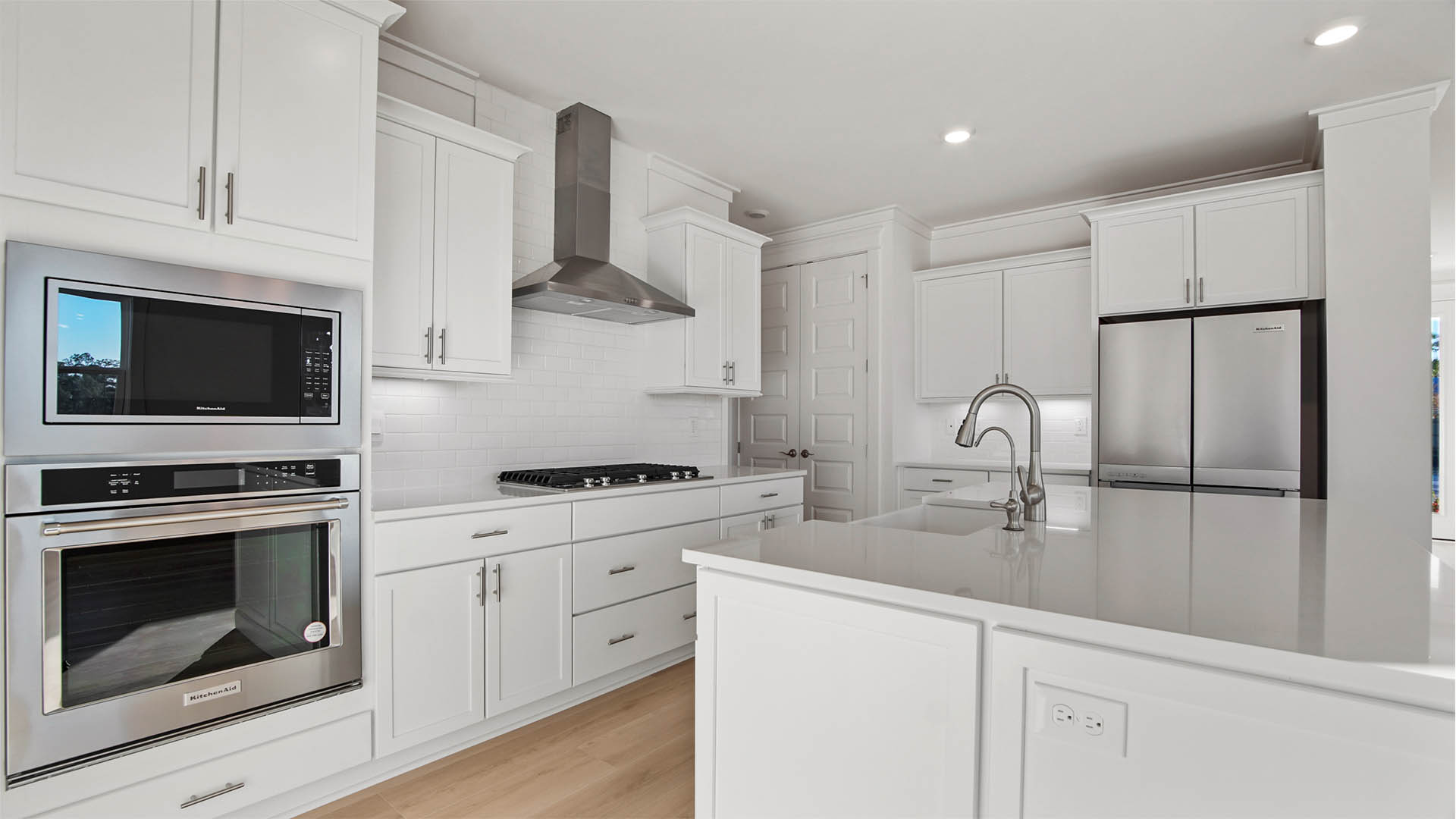 Gourmet kitchen with KitchenAid stainless steel appliances