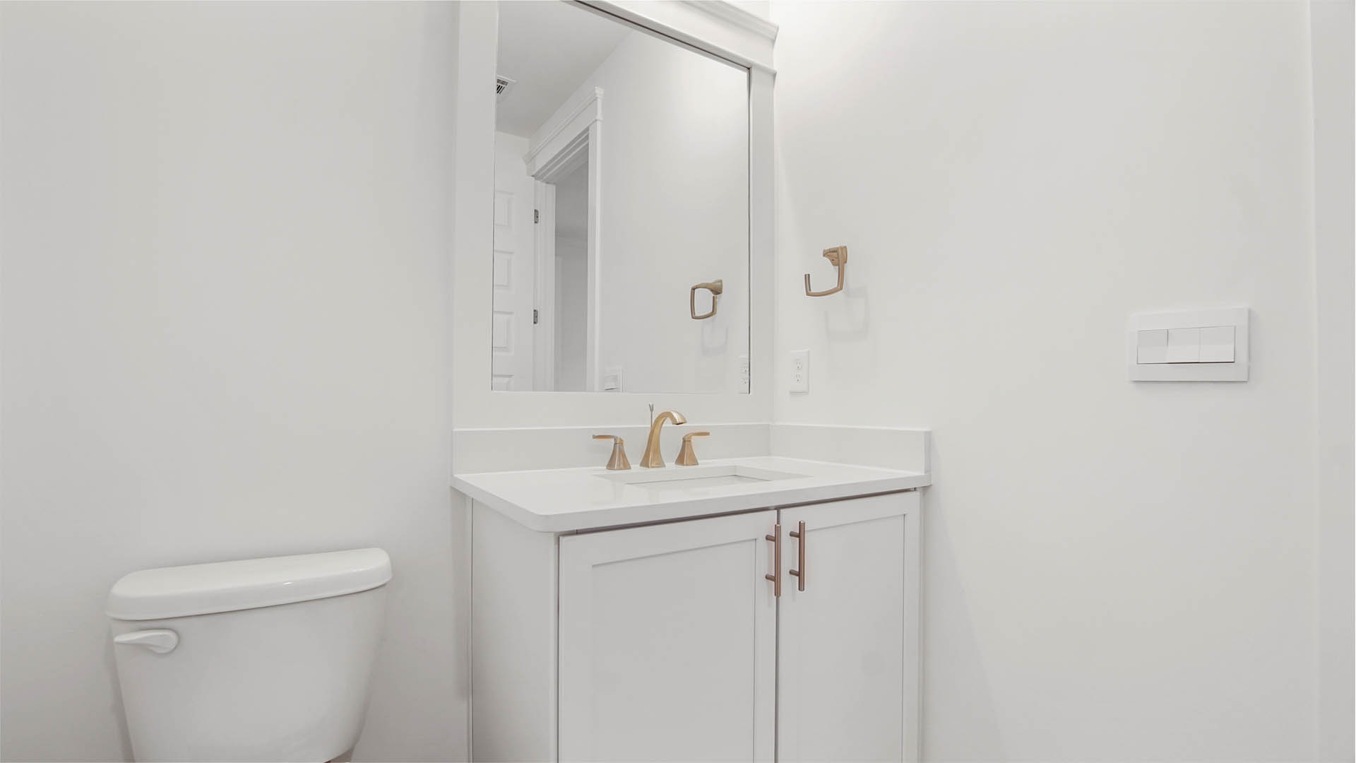 Bedroom three private bath with vanity and quartz countertop