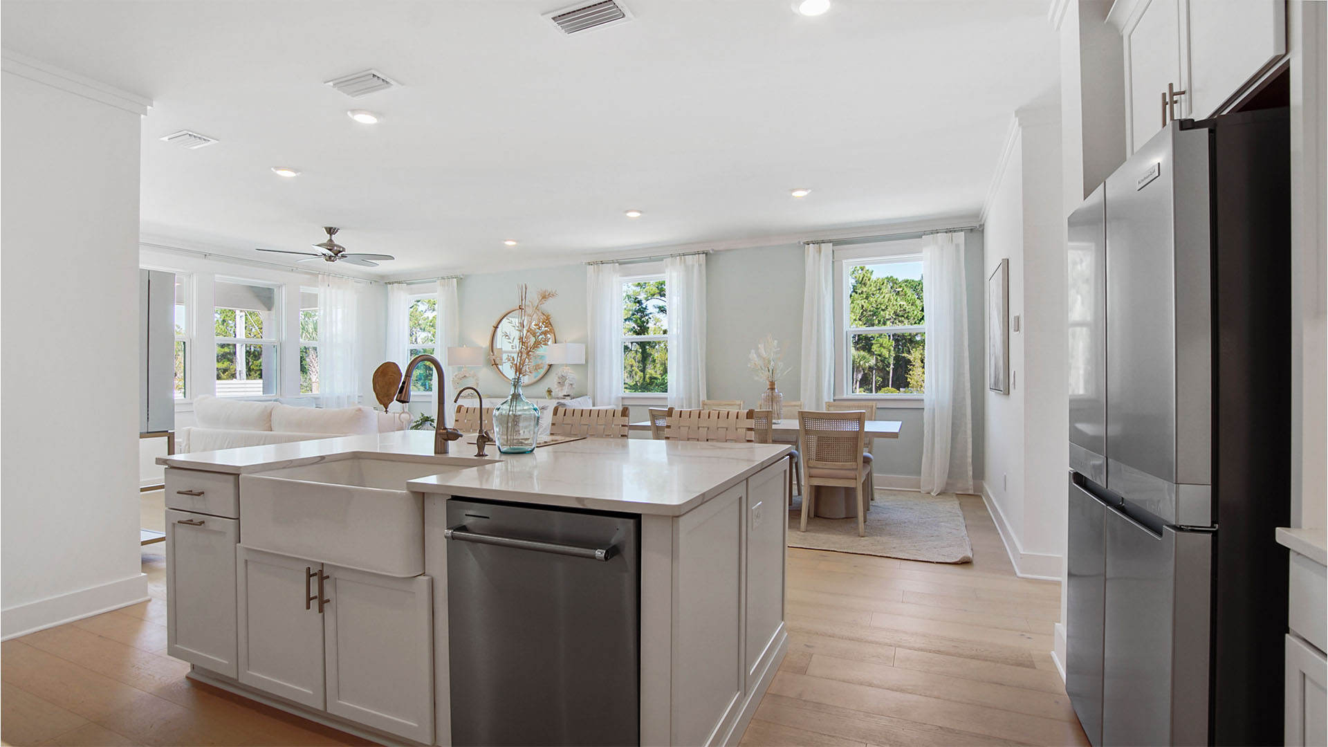 Kitchen island with well sink and dishwasher with hidden controls.