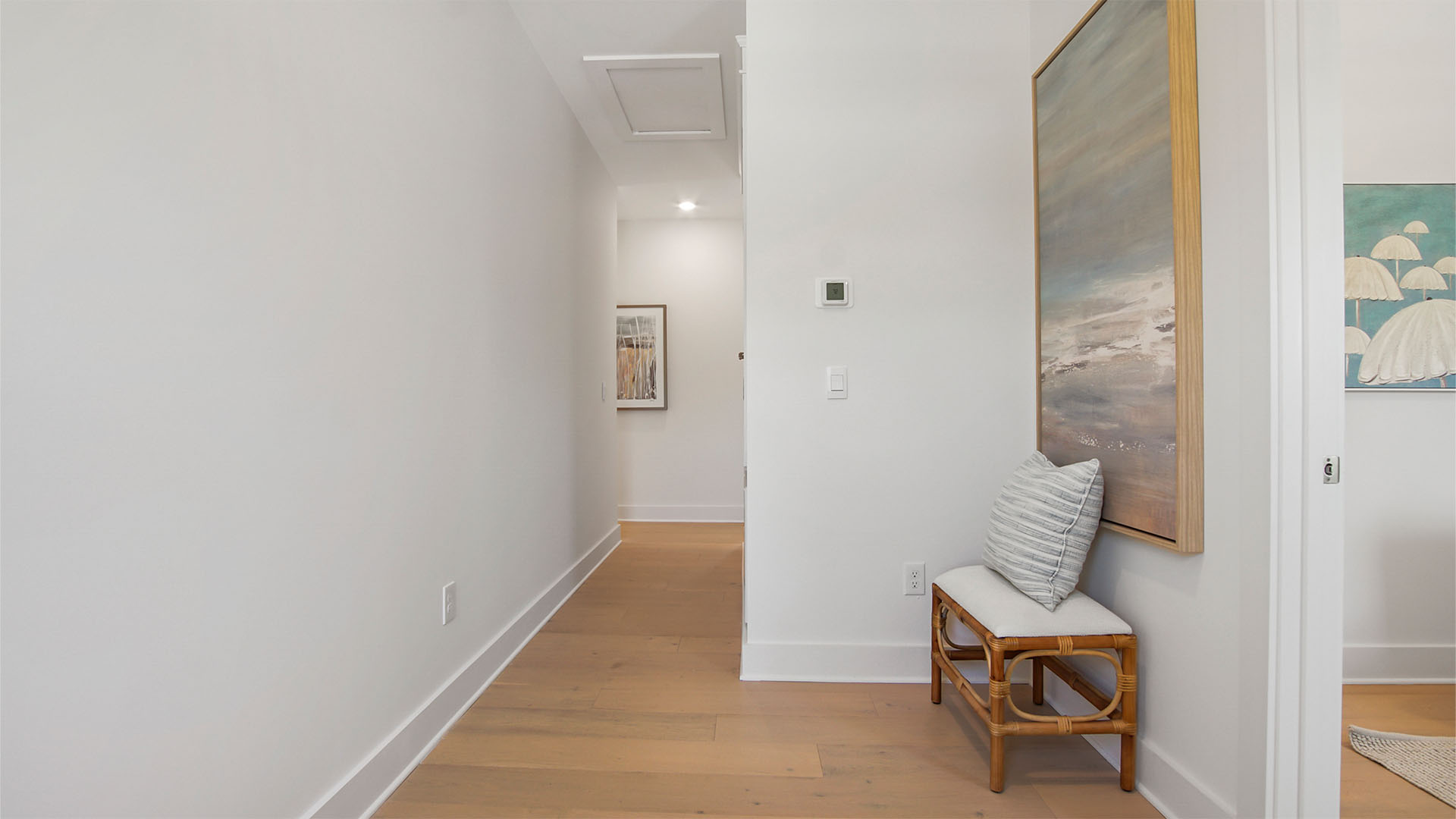 Hallway to bedrooms next to flex room.