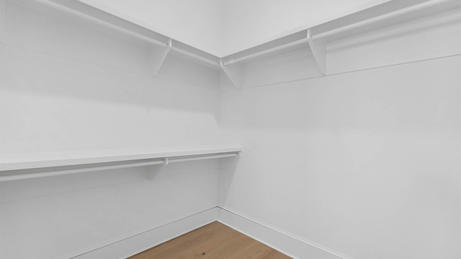 The third level primary bathroom has a large closet