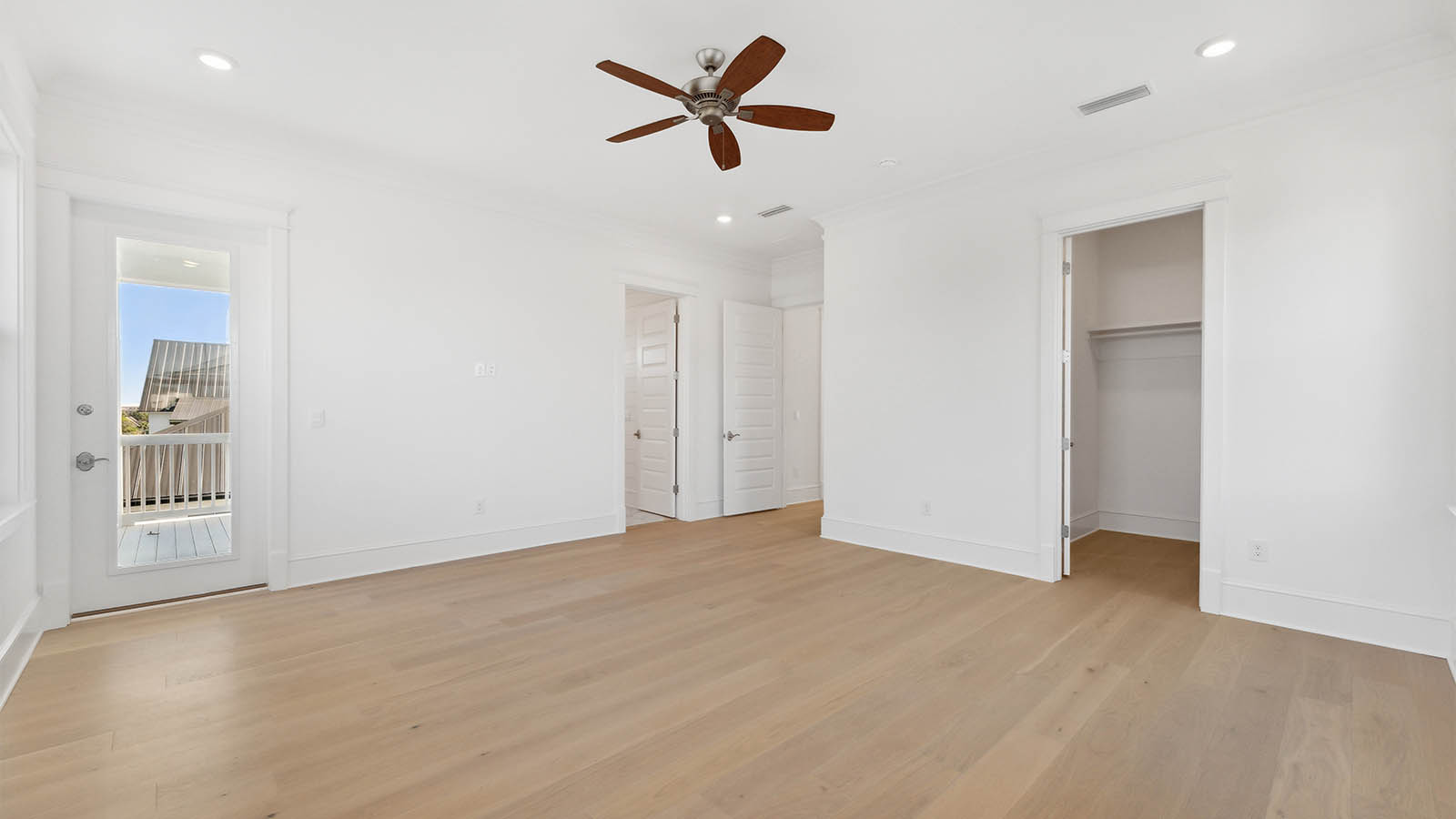 The primary bedroom on the third level has a private bathroom