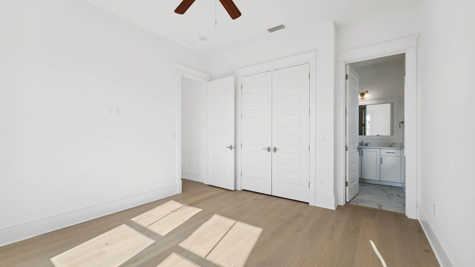 There are two guest bedrooms on the third level