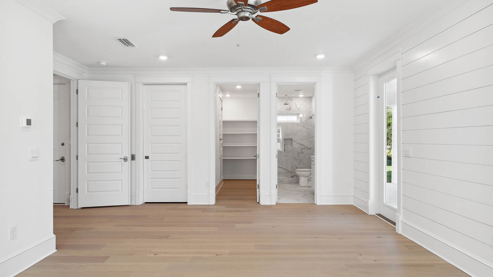 The main level flex room has a private bathroom