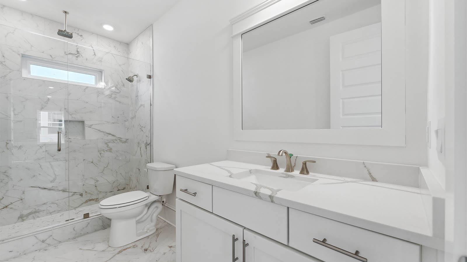 The full bathroom on the main level has a shower and single vanity