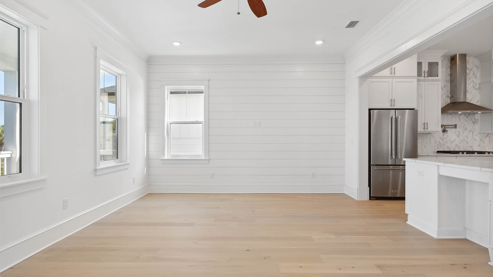 The great room and kitchen are adjoined allowing for easy entertaining of family and guests