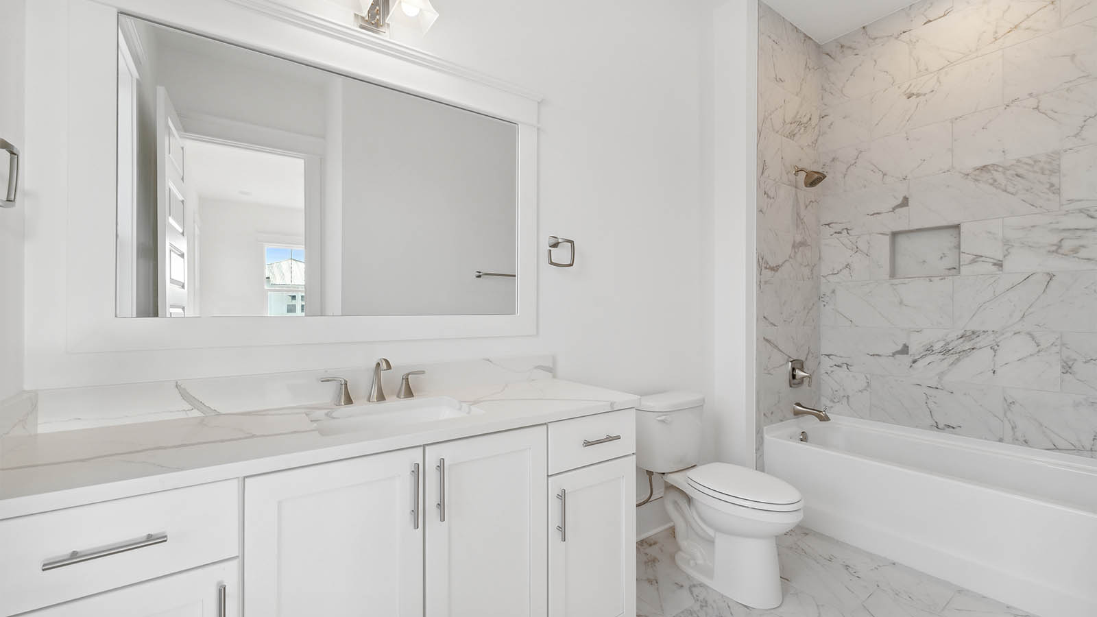 The guest bathrooms all have single vanities and shower tub combination