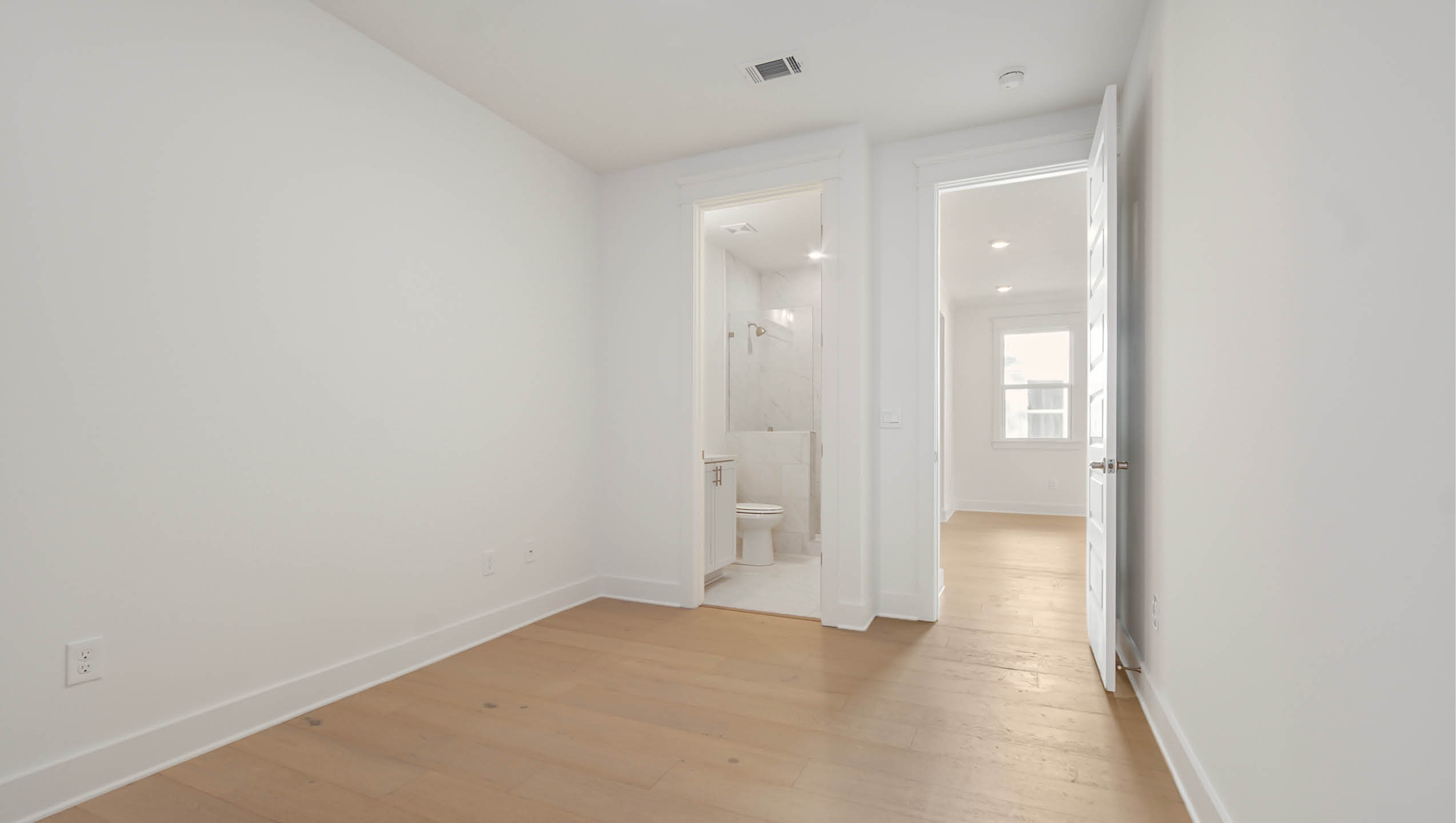 Bedroom two features its own private bathroom