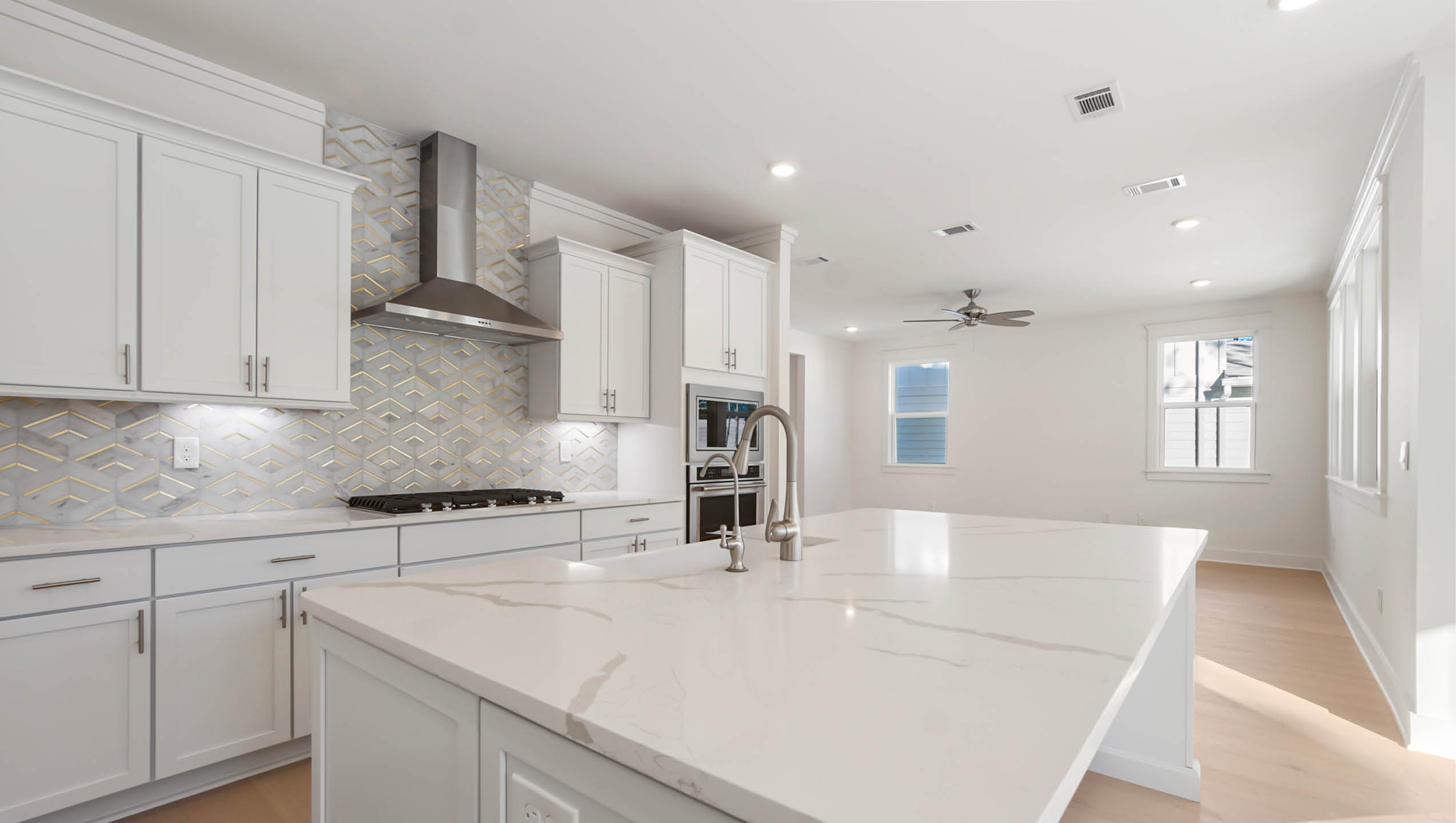 Large center island with space for bar seating and lower cabinetry