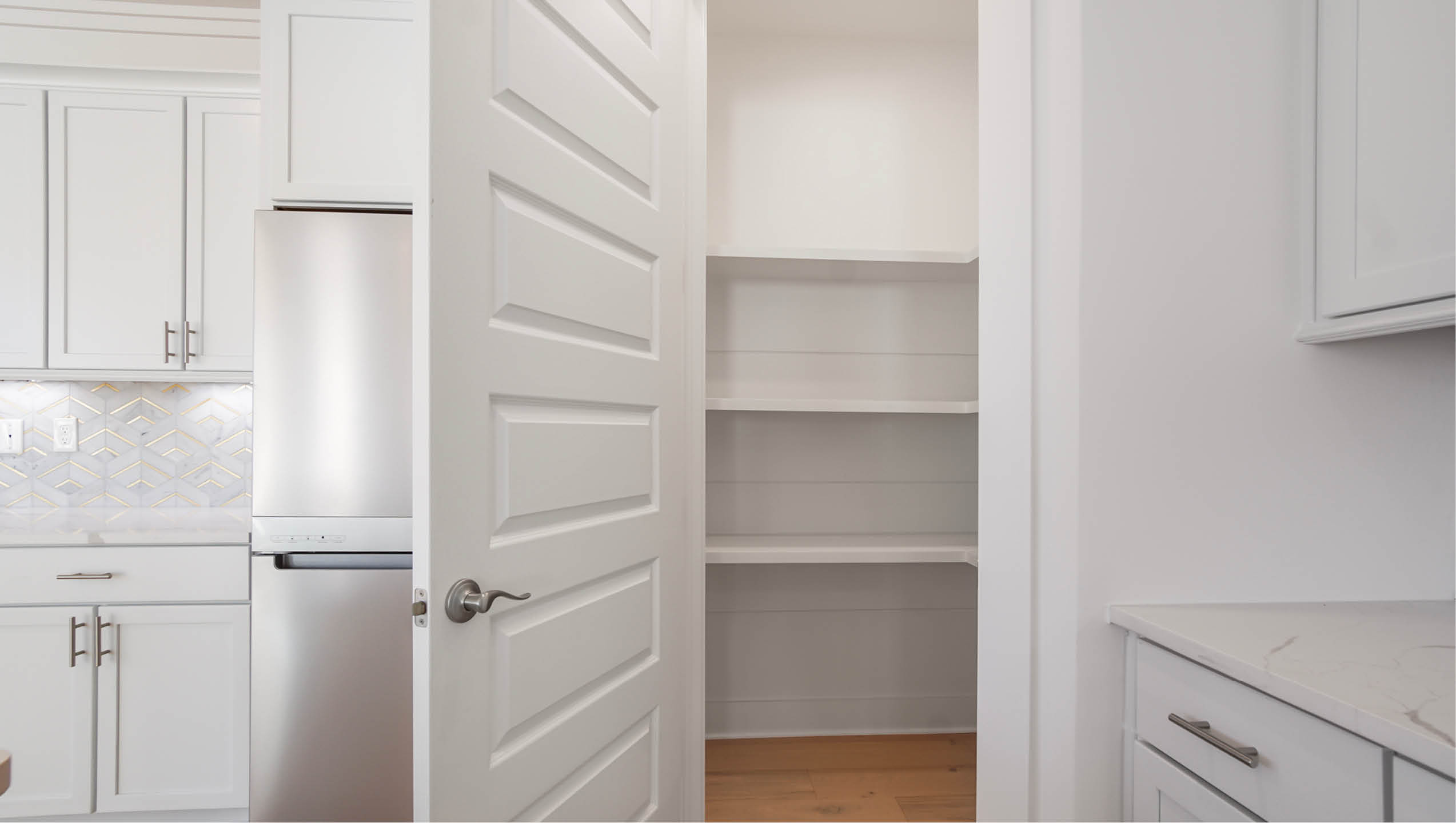 Large pantry with wood shelving