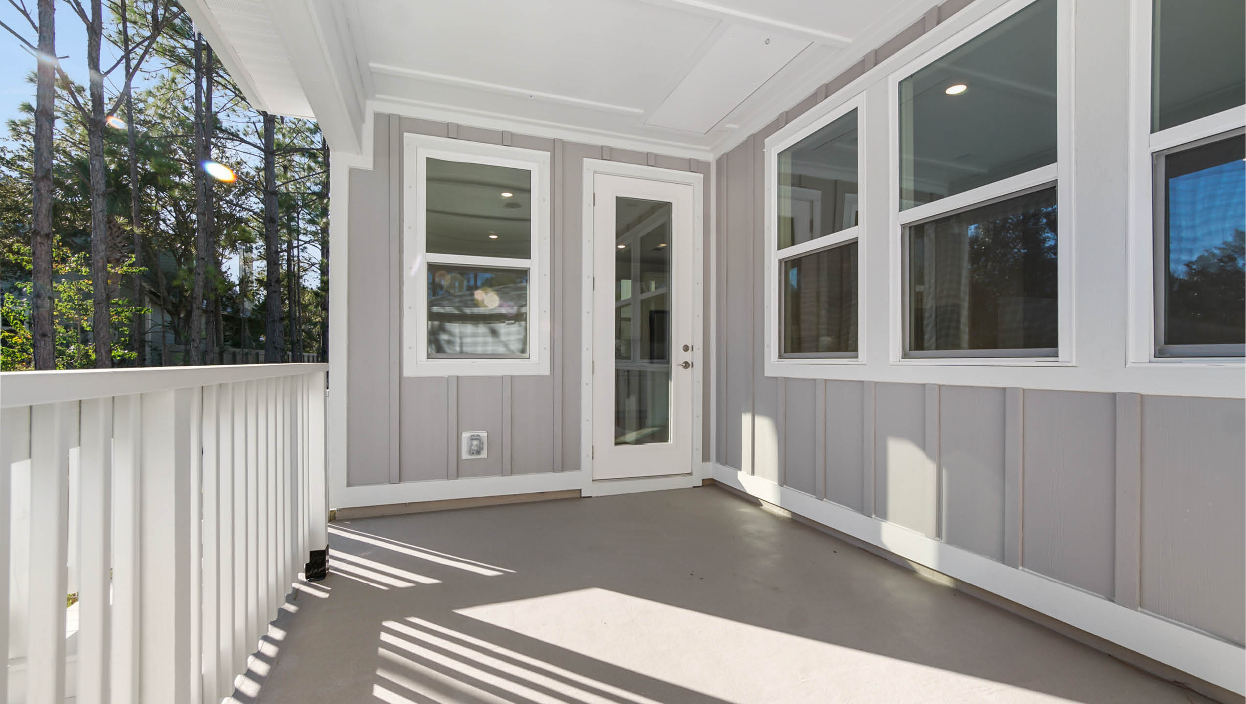 Covered porch with room for dining area and sitting area.