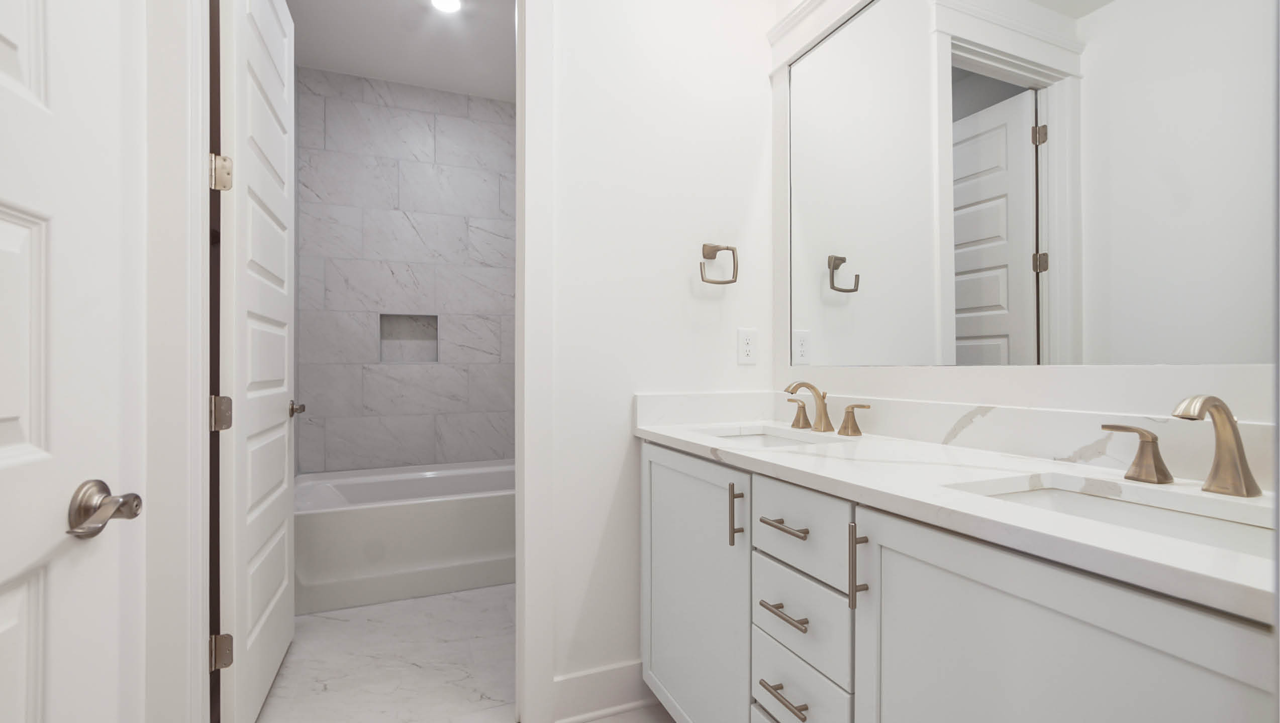 Shared bathroom in hallway for bedrooms three and four